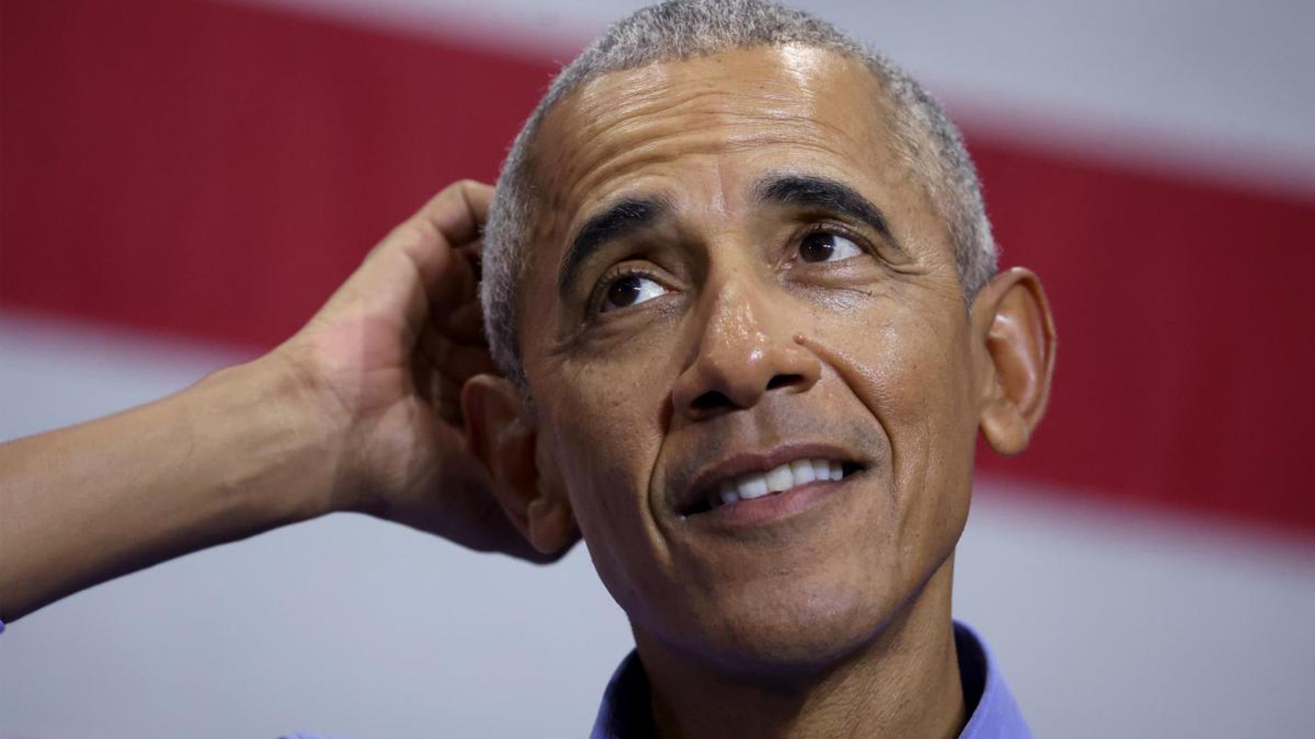A woman interrupts President Barack Obama’s speech with a steamy compliment