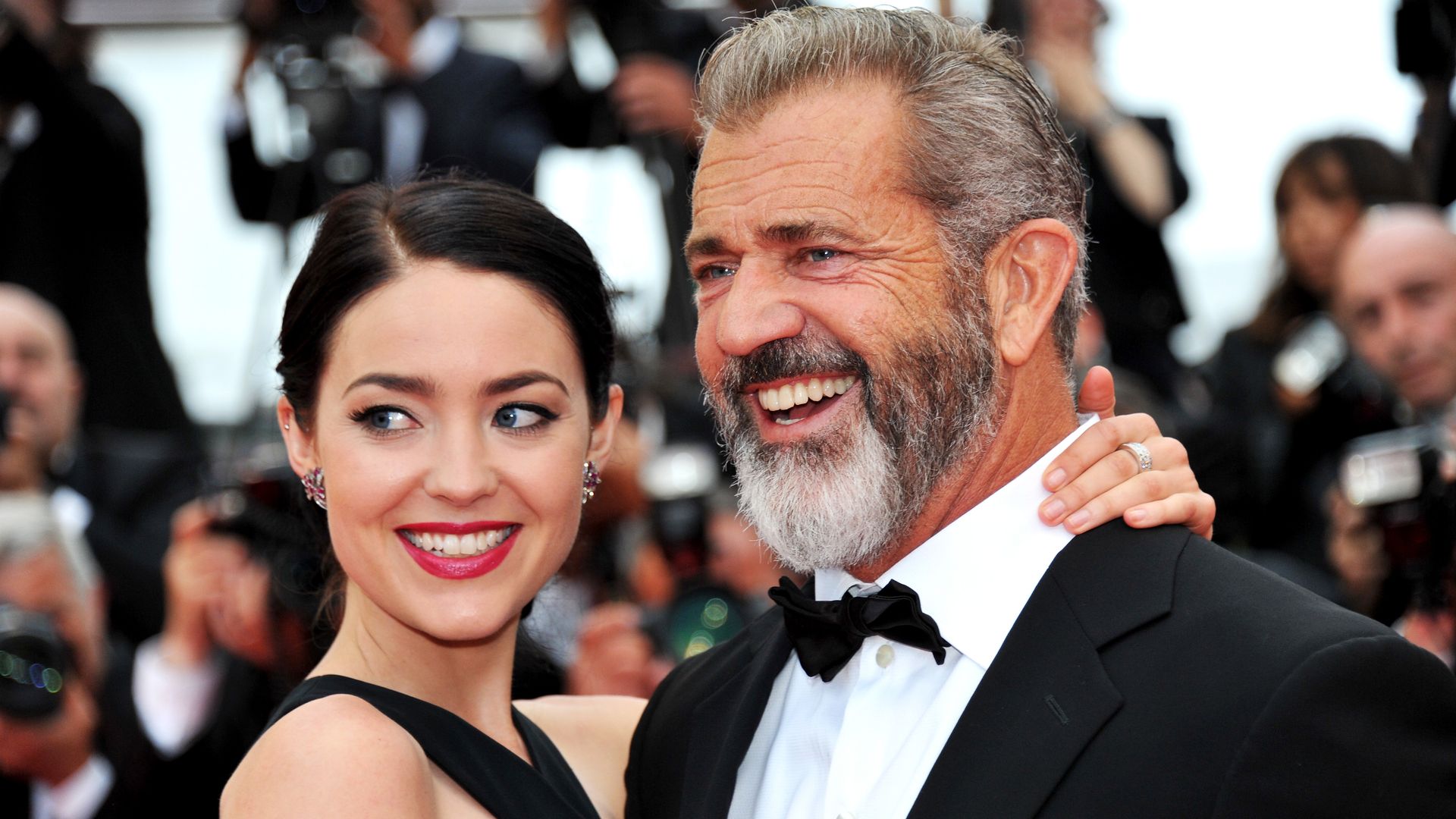 Mel Gibson (R) and Rosalind Ross attend the closing ceremony of the 69th annual Cannes Film Festival at the Palais des Festivals on May 22, 2016 in Cannes, France.