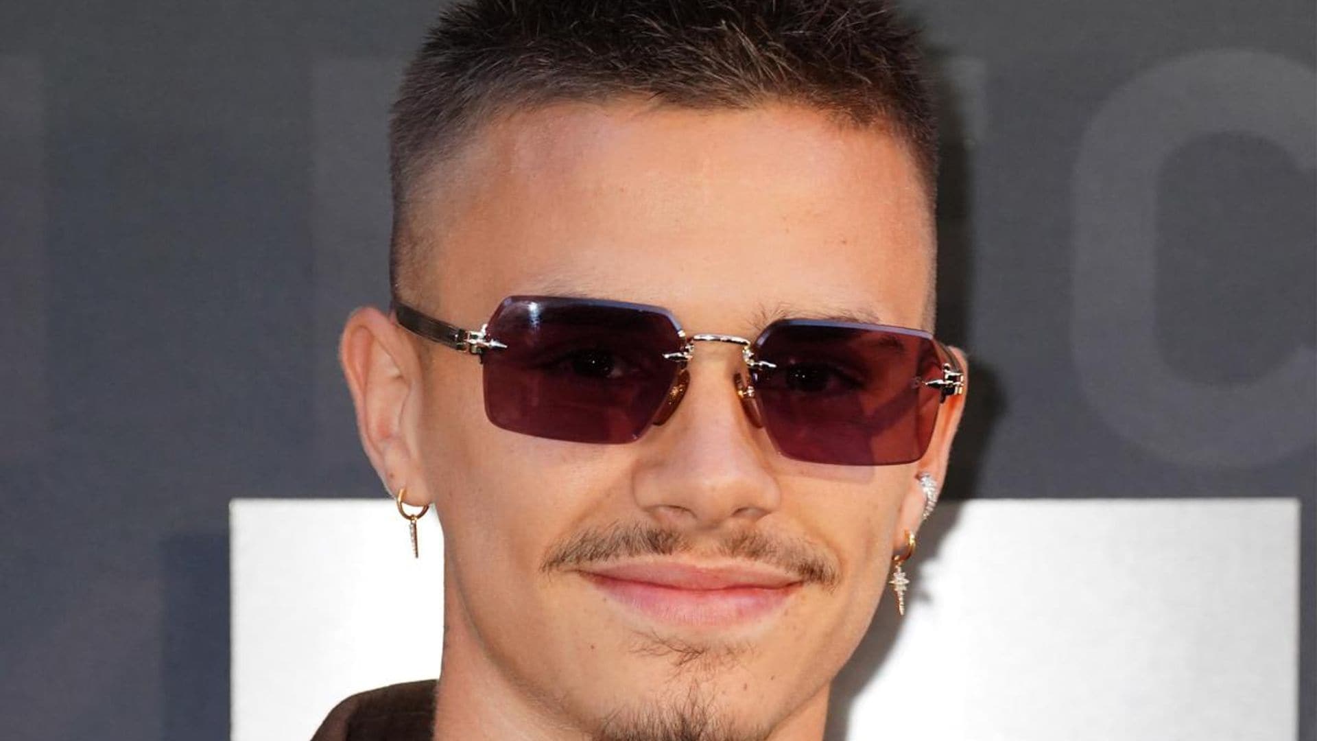 Romeo Beckham pays tribute to late Virgil Abloh with a quote tattoo