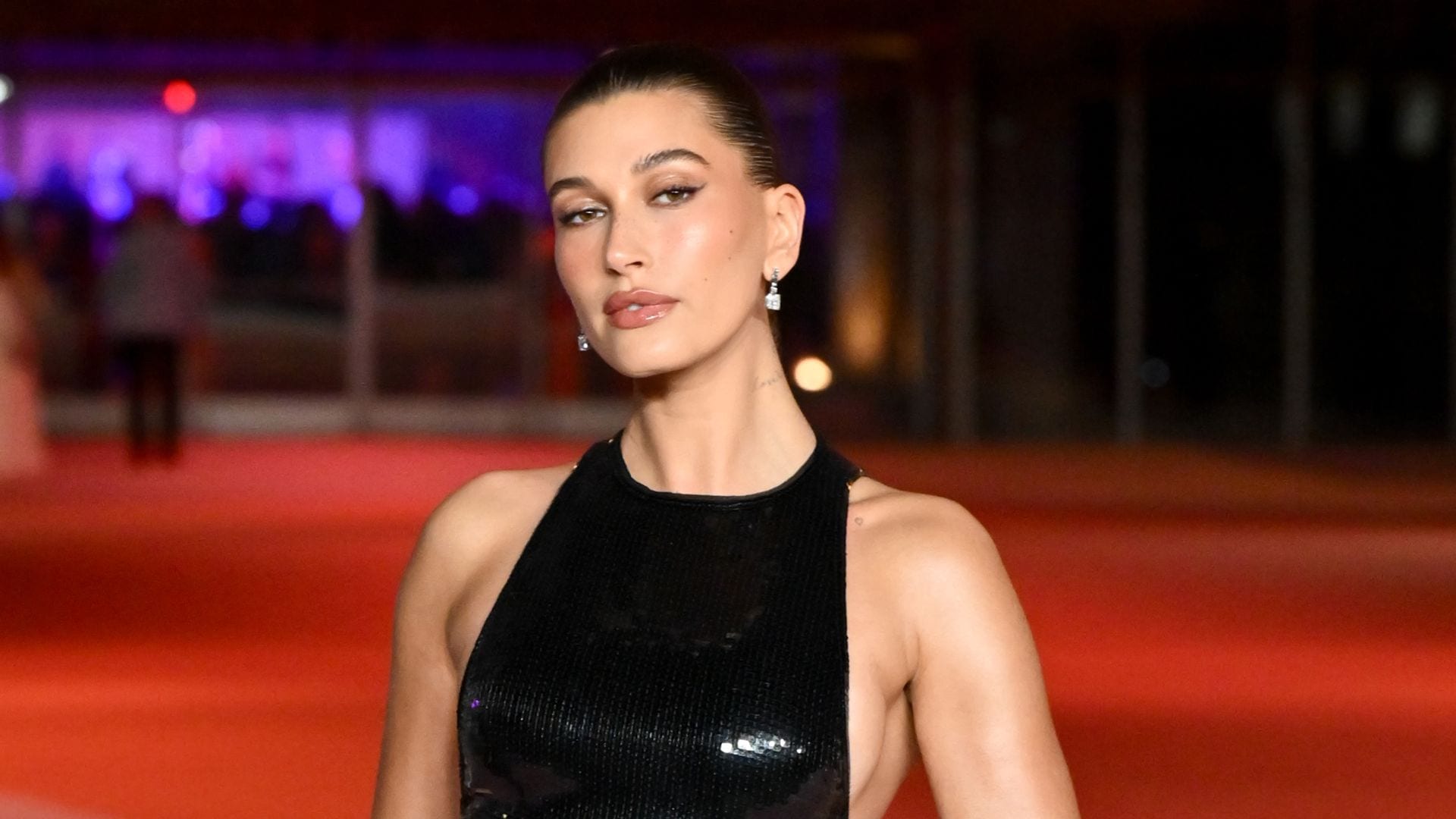 Hailey Bieber shows off her curves in a green string bikini: ‘Oh my god’