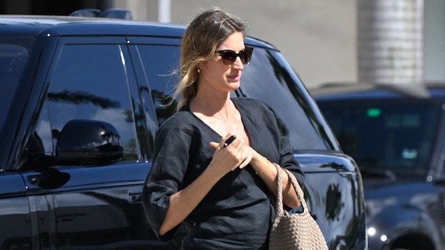 Pregnant Gisele Bundchen wears a cute black mini-dress while running errands in Miami. After successfully hiding the news that she and boyfriend Joaquim Valente have been expecting their first child together for the past five or six months, the supermodel, 44, is now openly displaying her growing baby bump.