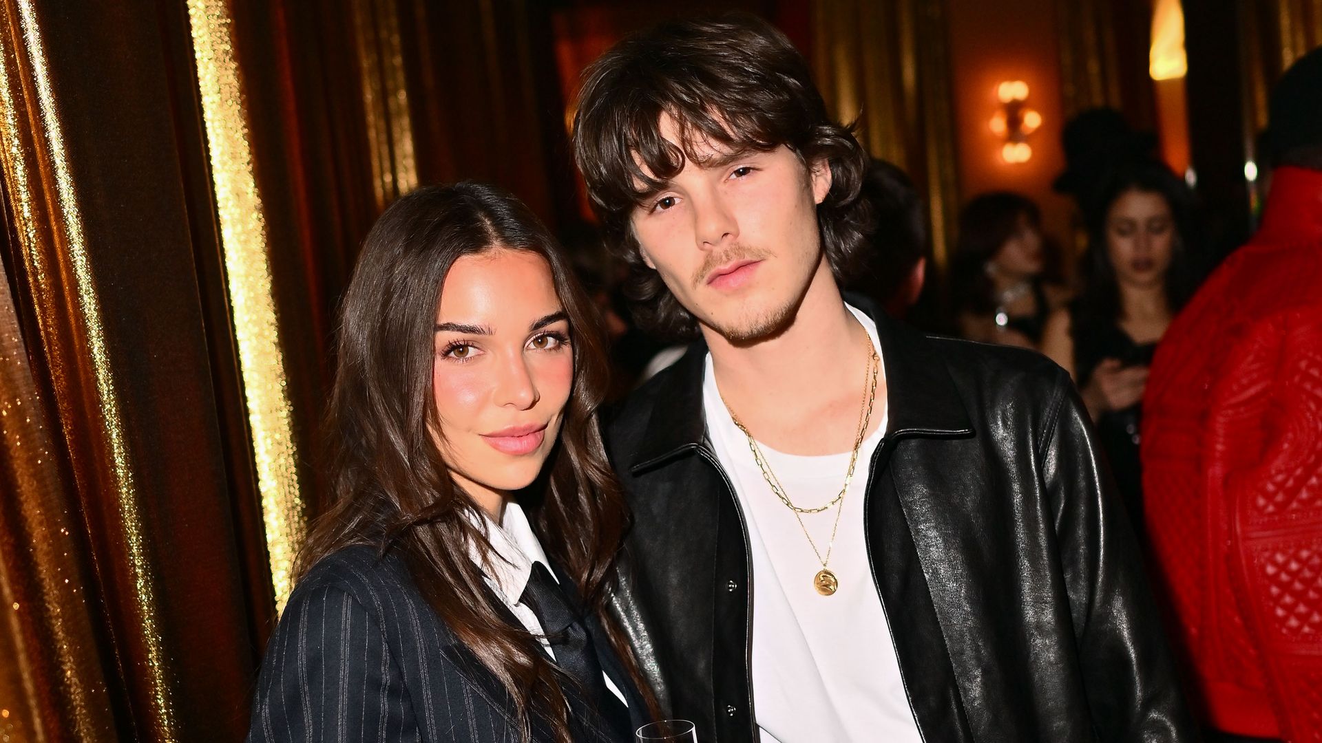 Cruz Beckham and new girlfriend Jackie Apostel are all smiles in Paris to support Victoria Beckham