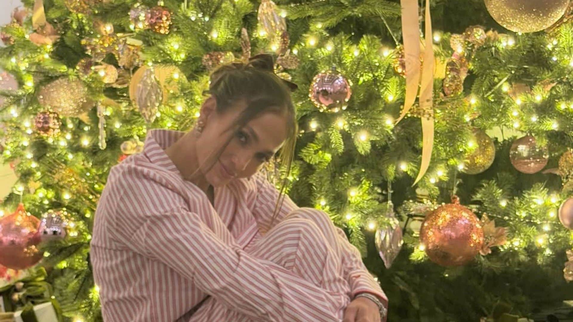 Jennifer Lopez ditched sequins for pink pajamas on Christmas eve, and somehow it still looked glam and stylish