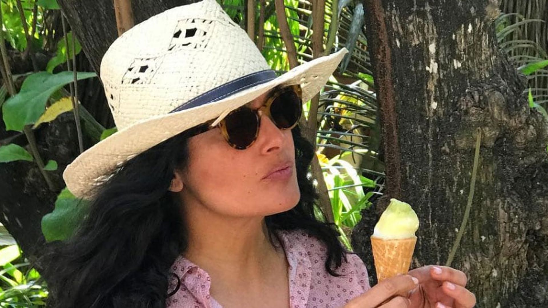 Salma Hayek kicks off the weekend (and leaves little to the imagination) in new video