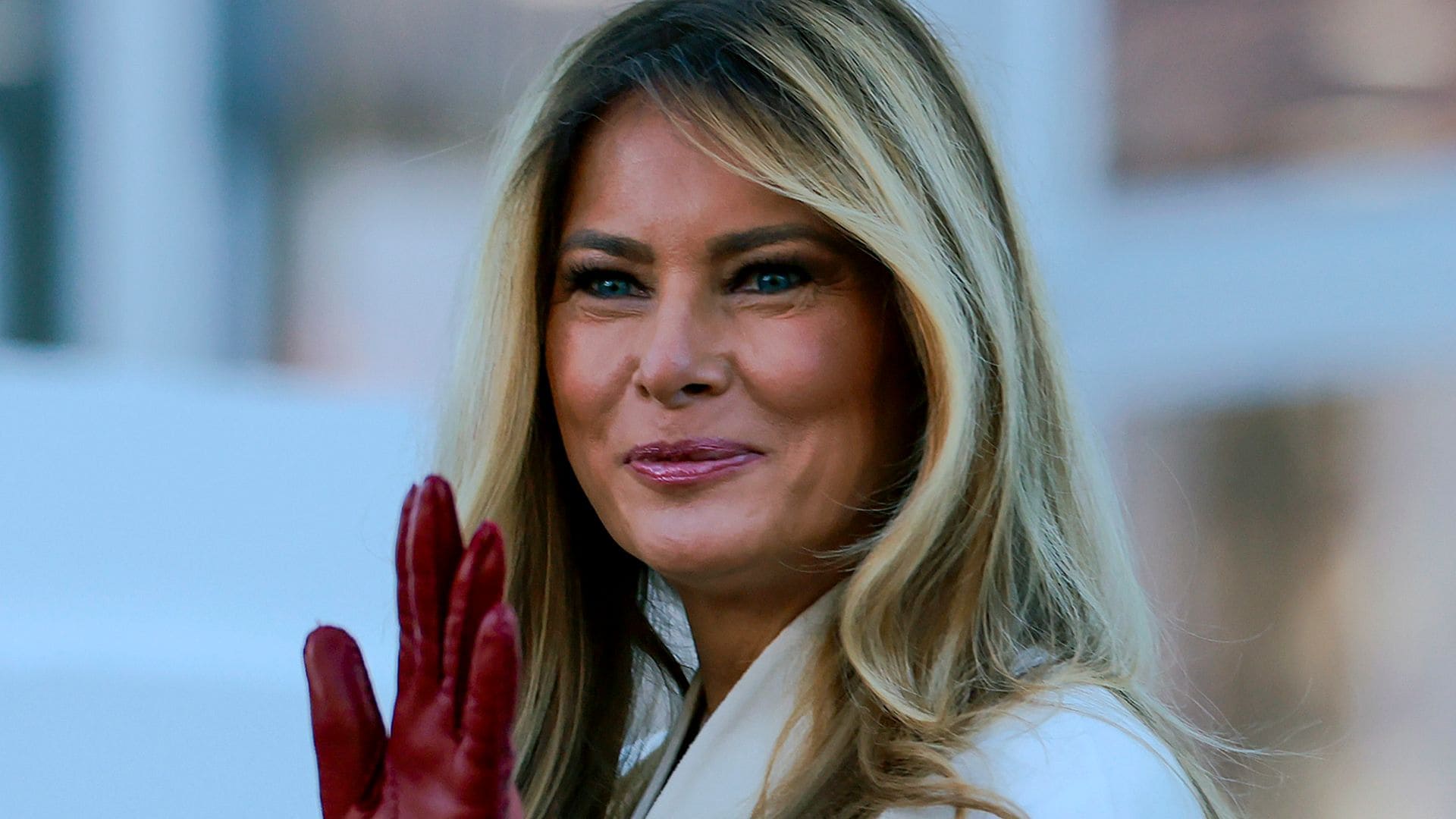 Melania wore a white coat that she paired with some red gloves for the occasion