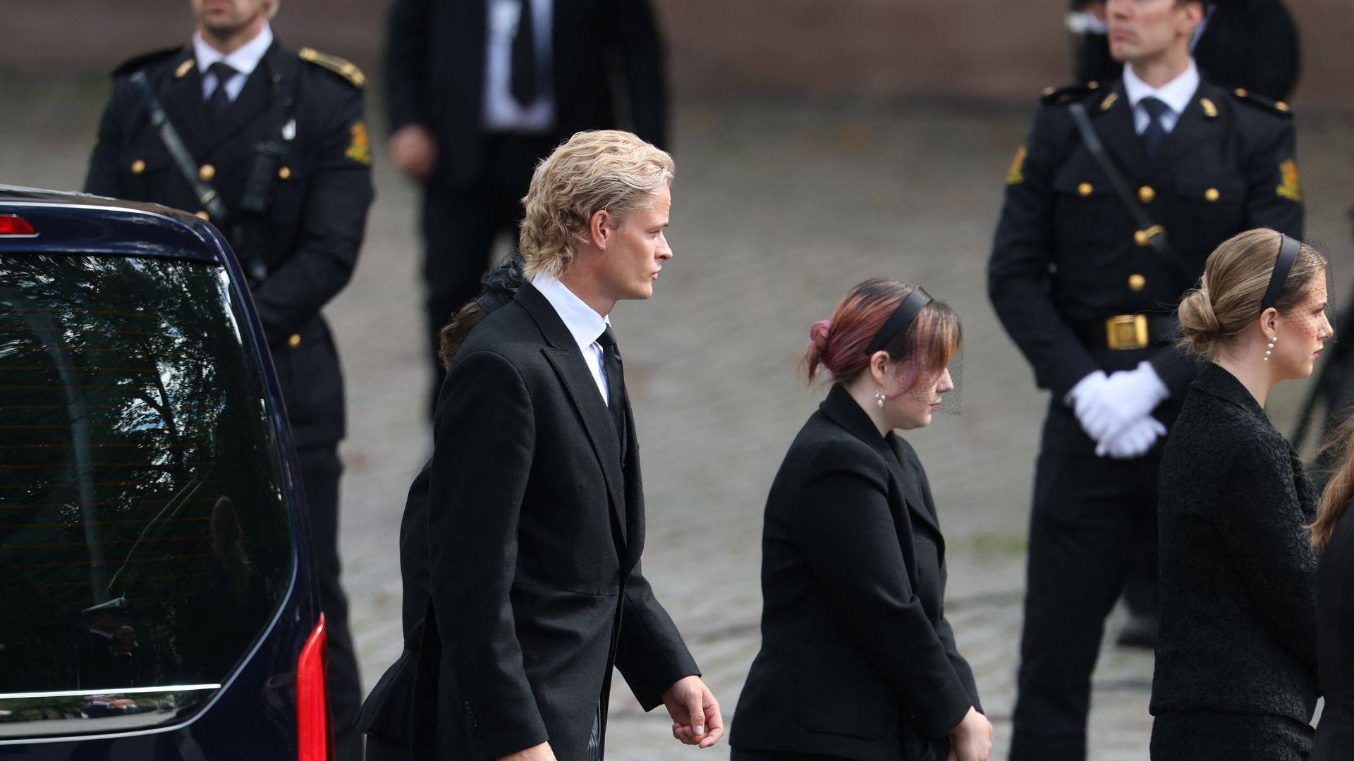 Son of Queen Mette-Marit of Norway Marius Borg Hoiby (L) and the daughters of Princess Martha Louise of Norway arrive in front of the Oslo Cathedral for the arrival of the casket of late King Harald V of Norway in a royal procession in Oslo on September 9, 2026.
