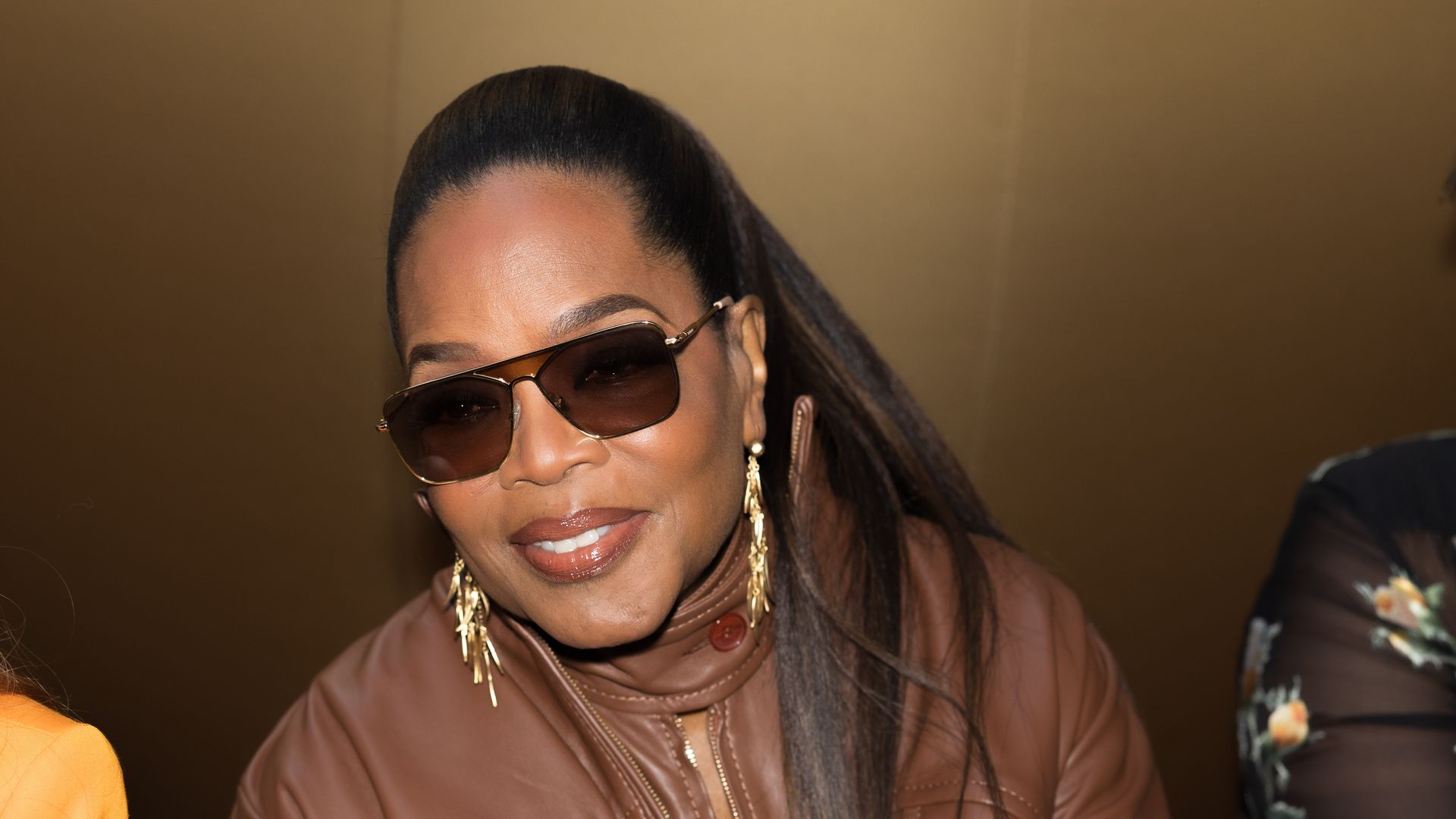 Her jewelry choices remained elegant and minimal.