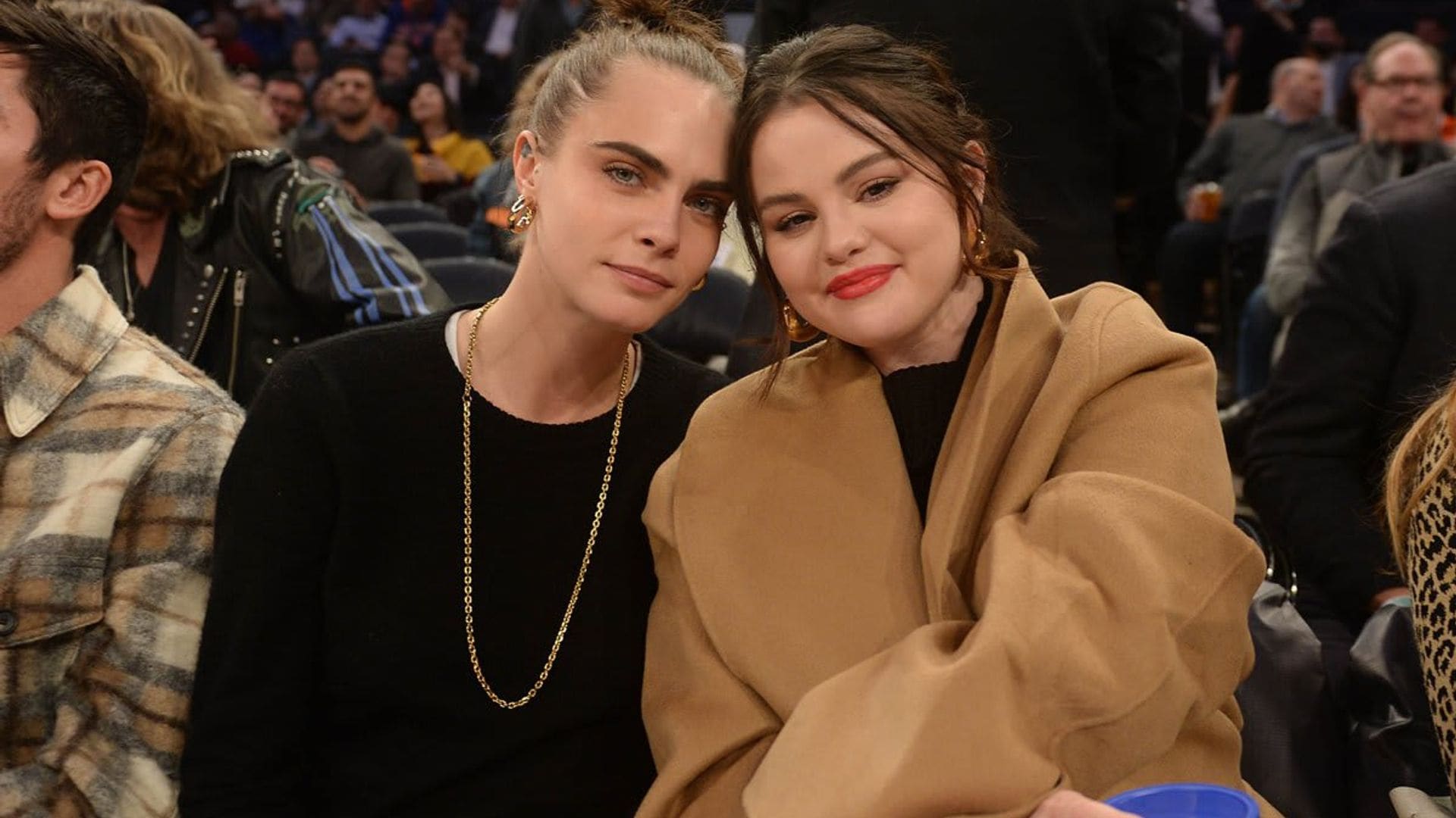 Selena Gomez & Cara Delevingne share a cute kiss cam moment in NBA game