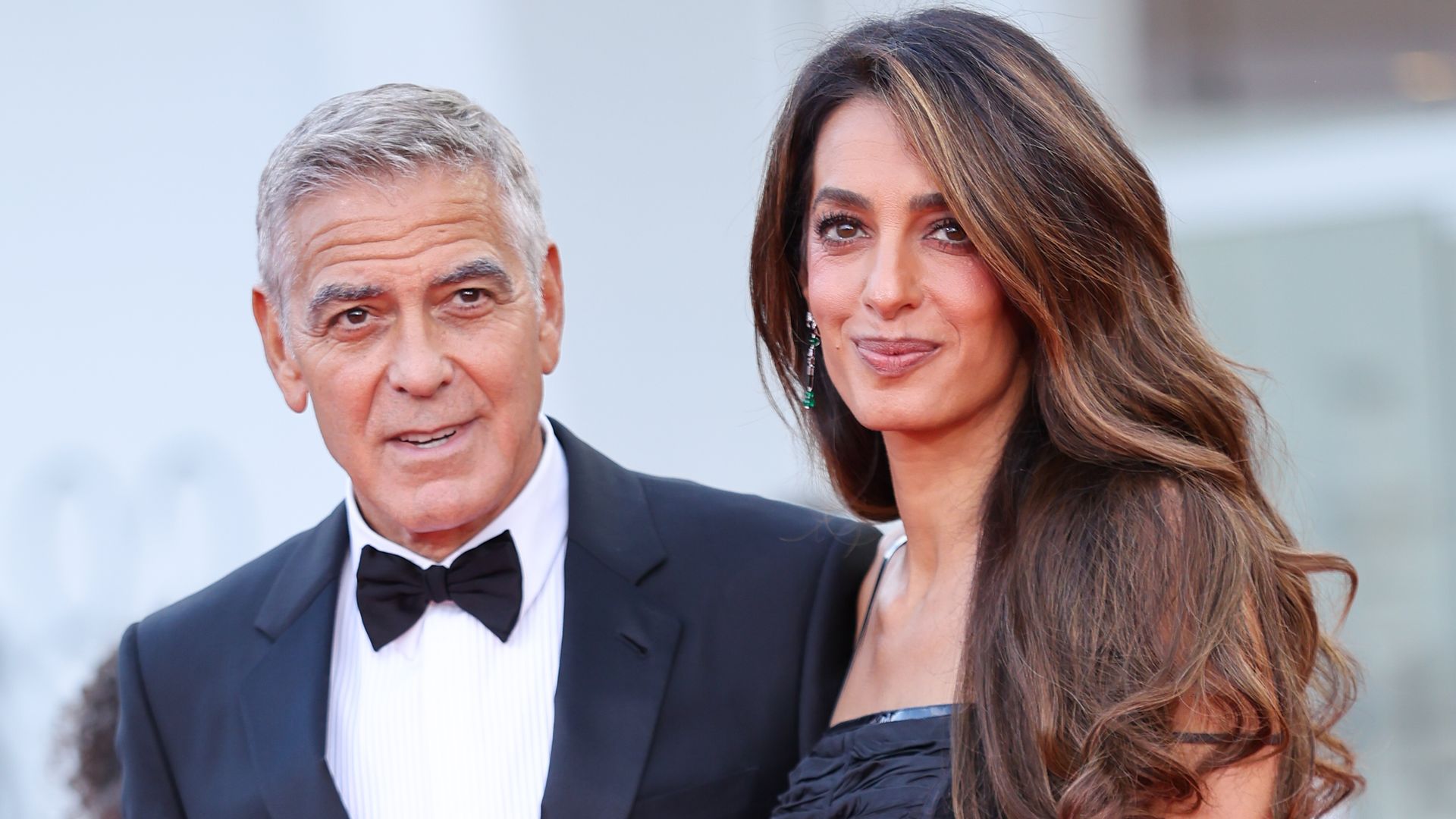 Amal and George Clooney look straight out of a rom-com on romantic Venice date night