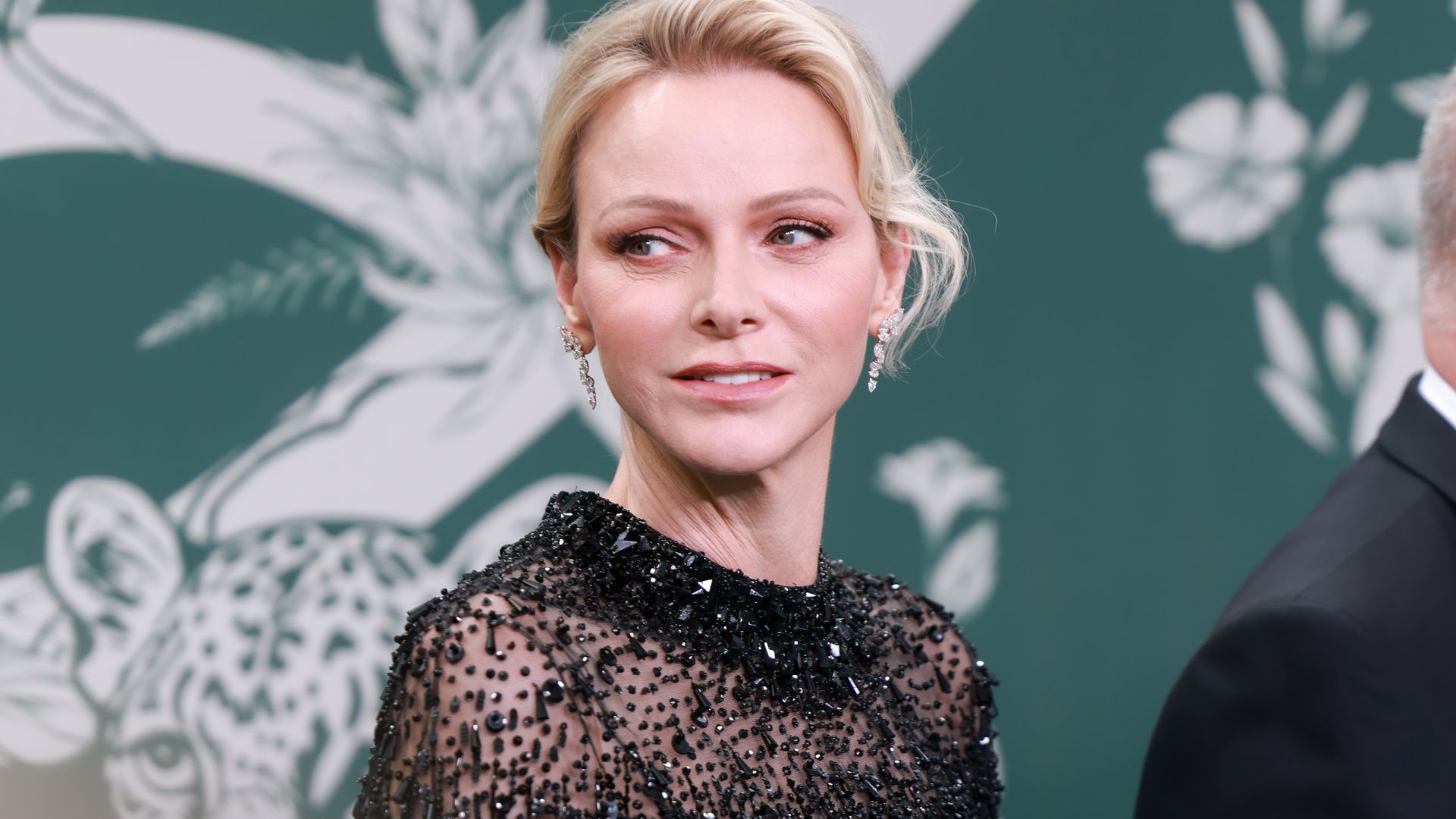 Princess Charlene gives her chic autumn suit an unexpected finishing touch