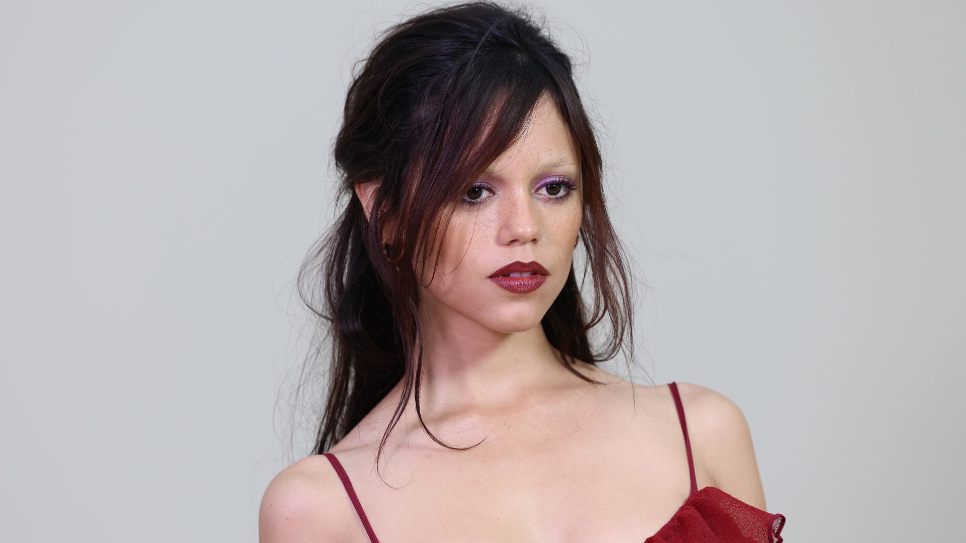 Jenna Ortega and Jennifer Lopez share a bold fashion moment in sculptural armor-inspired couture