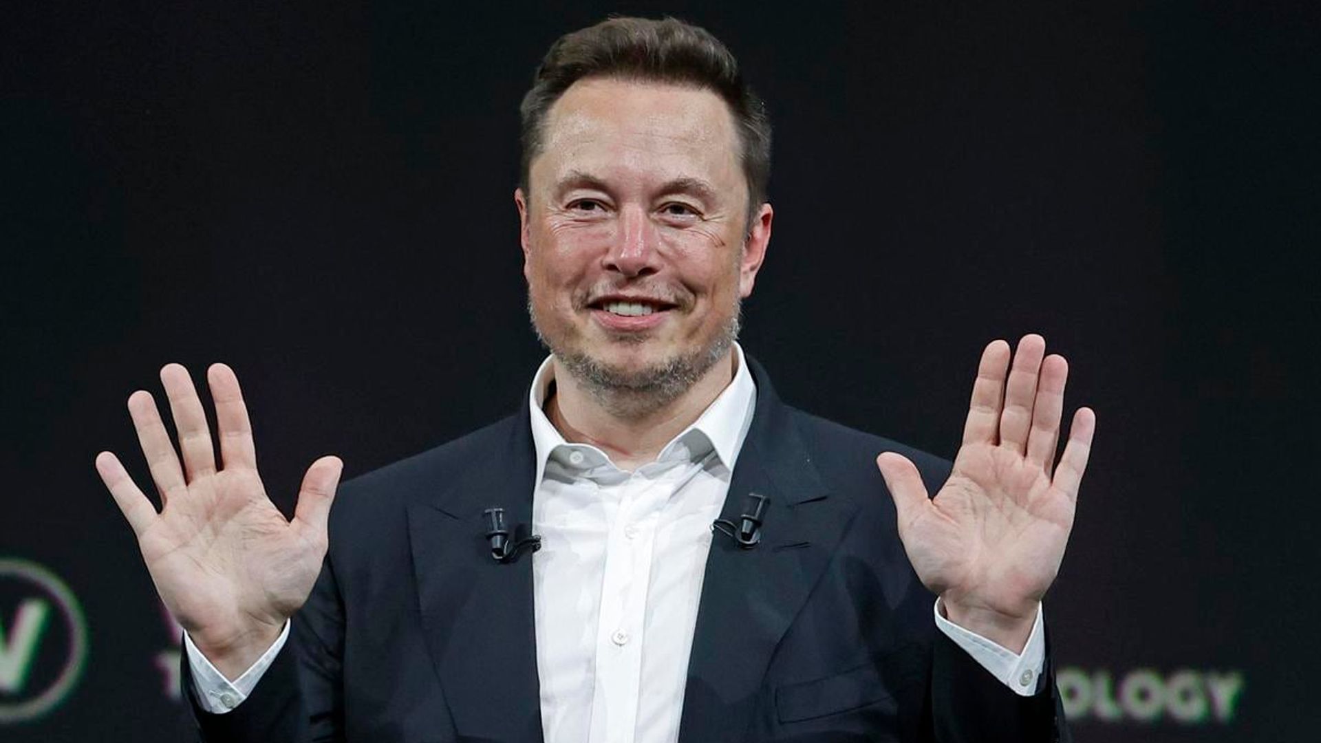 Elon Musk and his three year old son spotted at the Formula 1 U.S. Grand Prix
