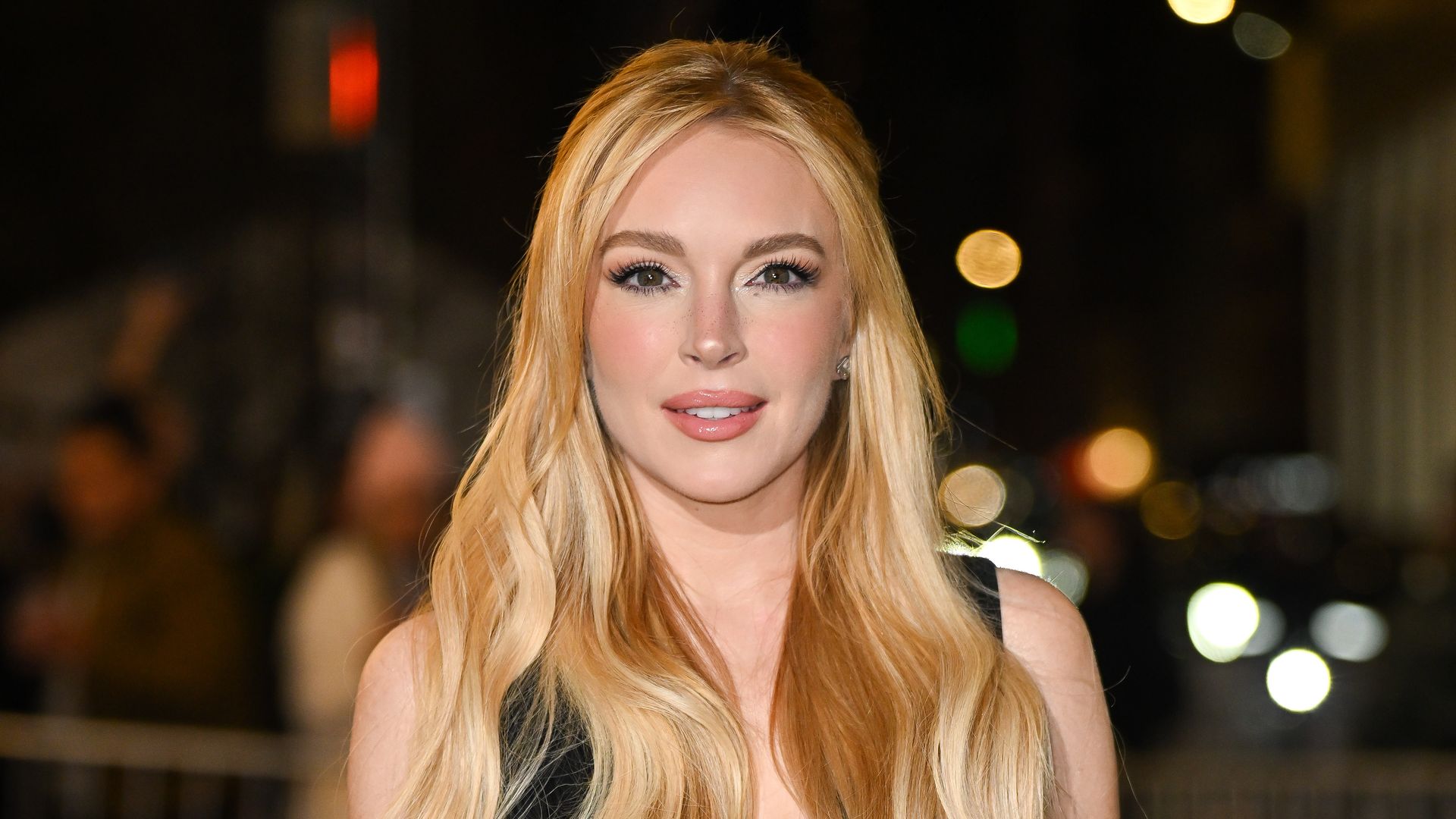 Lindsay Lohan goes makeup-free on her family's Italian vacation, sharing new pics of baby Luai