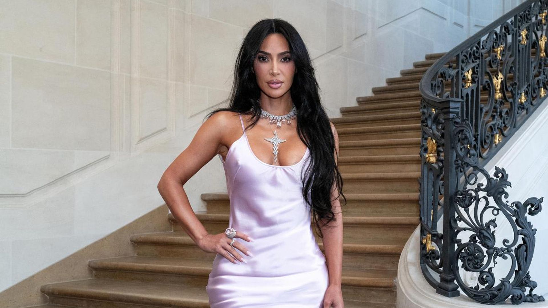 Kim Kardashian appears to be mortified after holding Victoria Beckham’s Paris fashion show