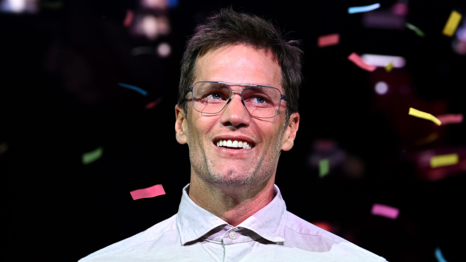 NEW YORK, NEW YORK - JUNE 22: Tom Brady speaks onstage during Fanatics Fest NYC 2025 at Javits Center on June 22, 2025 in New York City.  (Photo by Bryan Bedder/Getty Images for Fanatics) 
