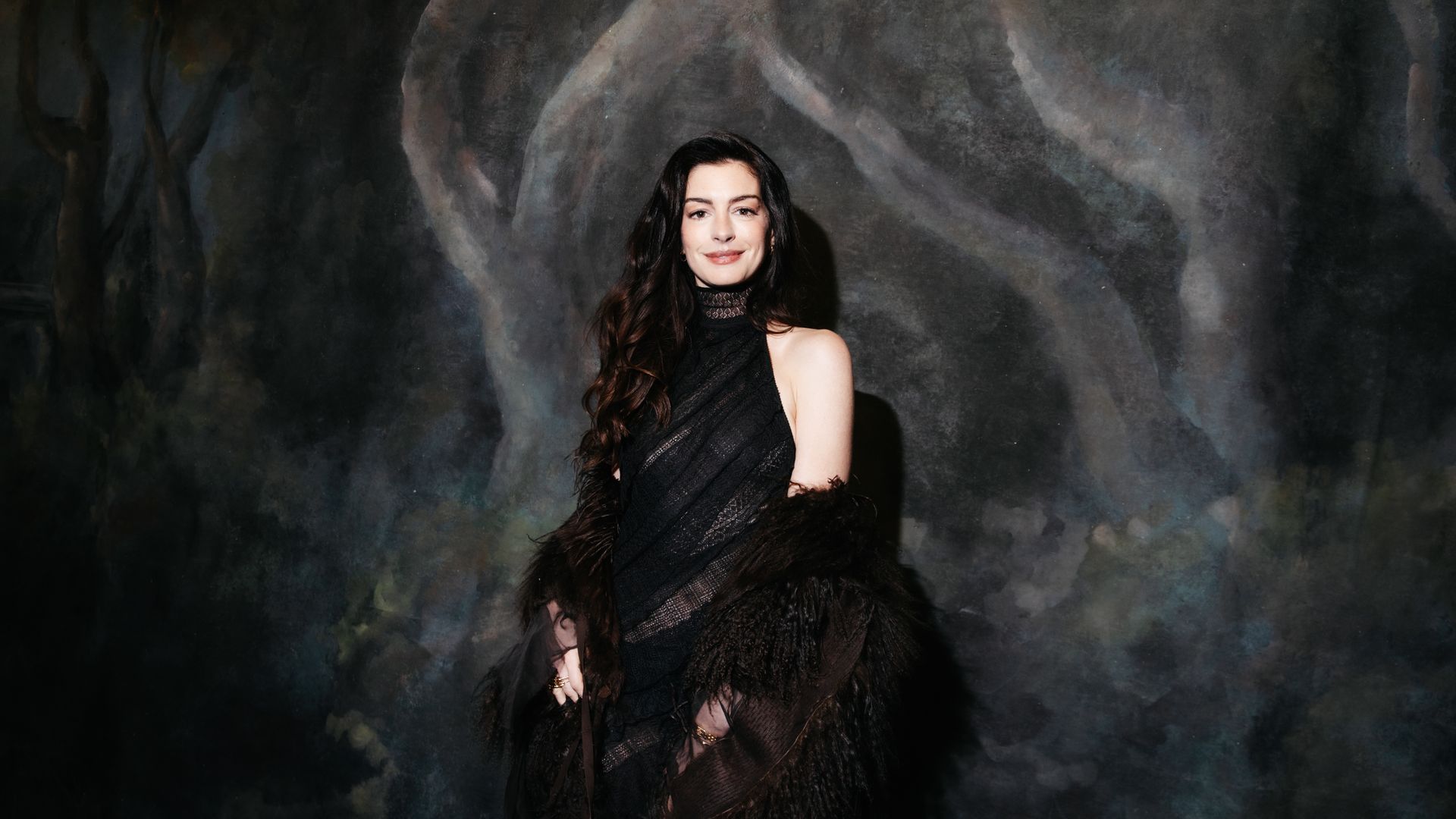 Anne Hathaway opens New York Fashion Week in a lace look that redefines modern glamour
