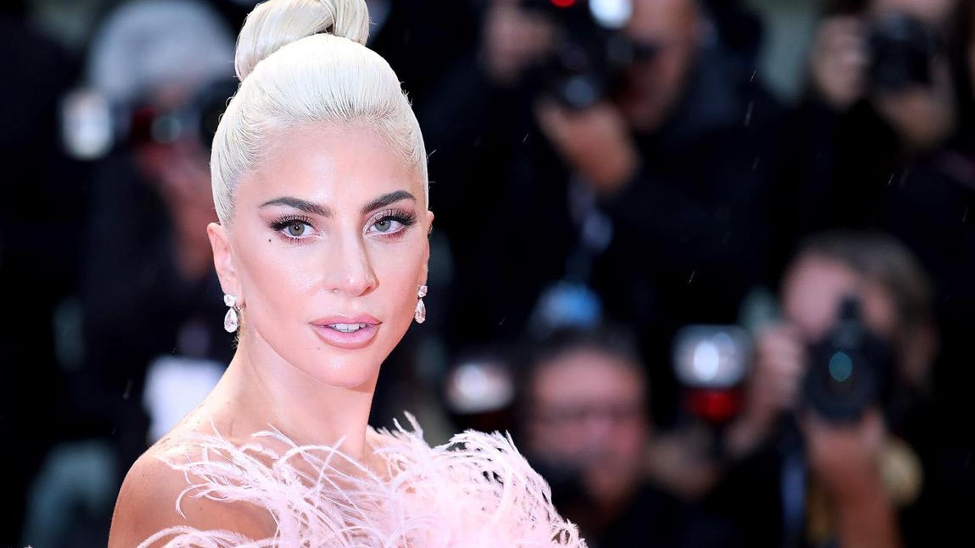 Lady Gaga goes makeup free showing off her sun-kissed complexion and feathered brows