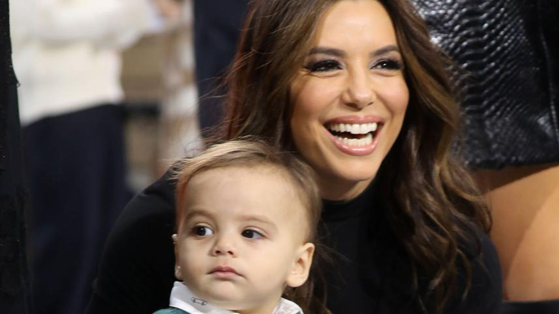 Eva Longoria and Santi get glammed up for the L'Oréal Le Defile at PFW