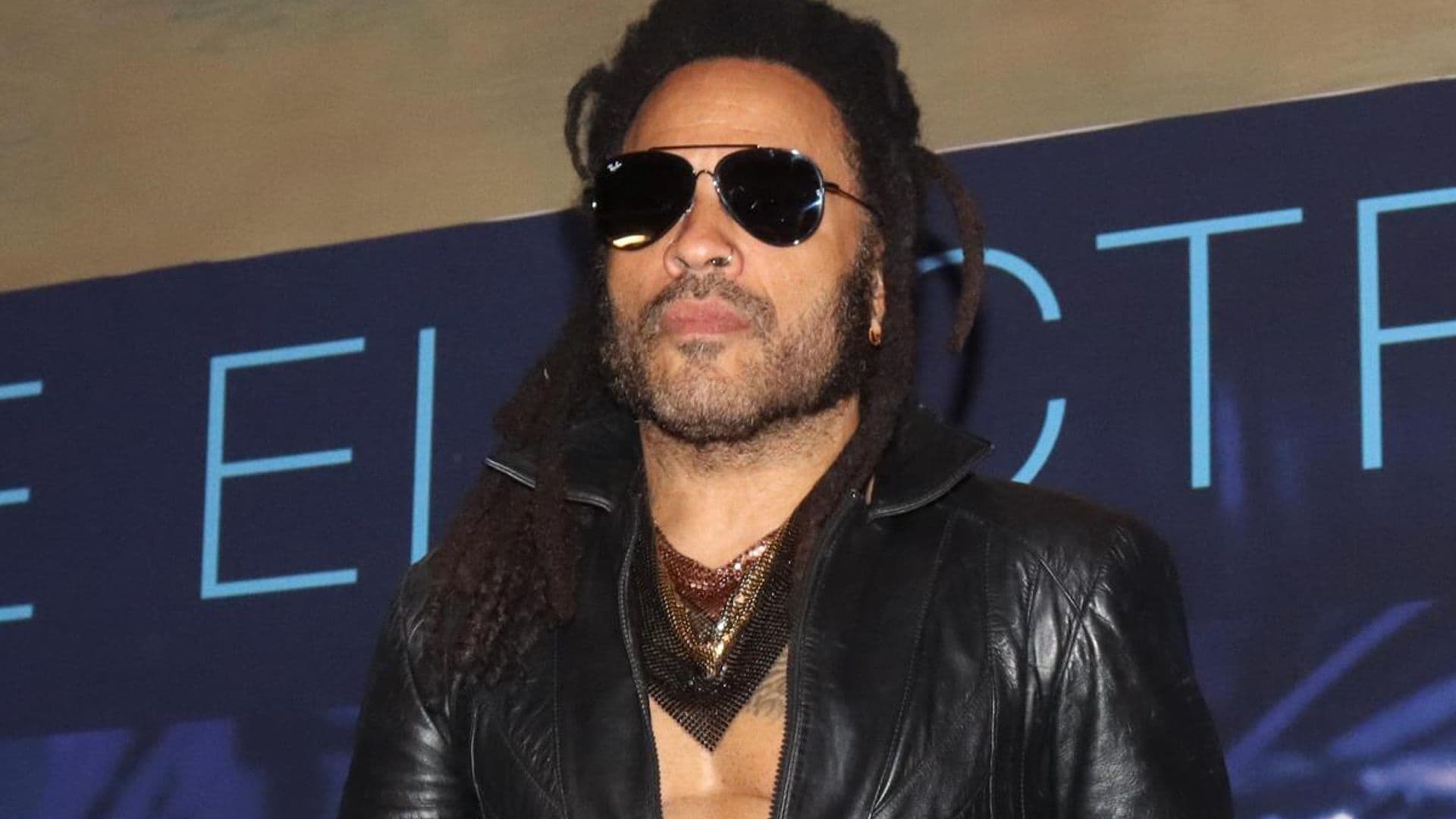 Lenny Kravitz works out in leather pants, boots, and a mesh tank top in must-see video