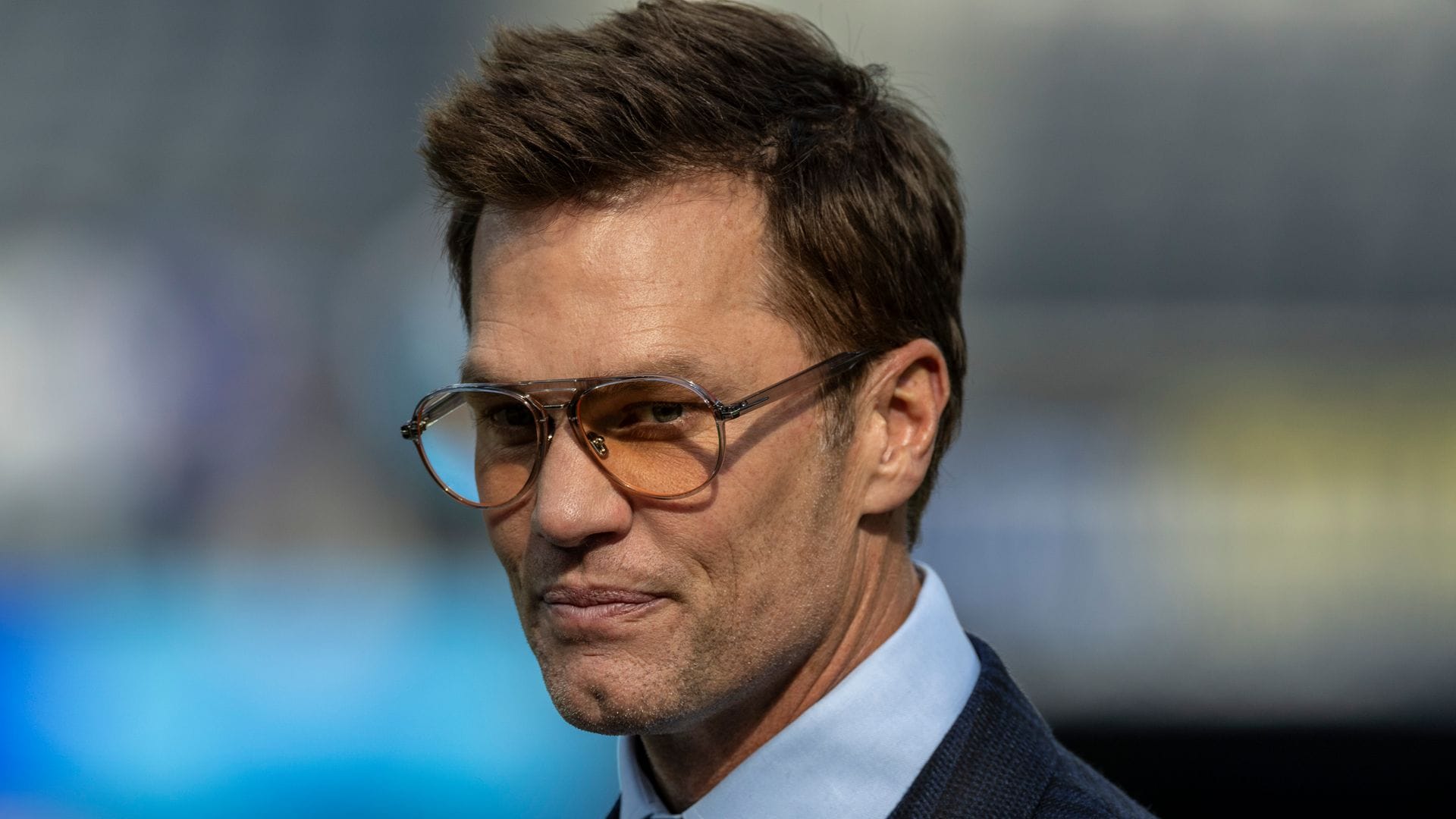INGLEWOOD, CA - DECEMBER 14: Fox Sports commentator and former NFL quarterback Tom Brady on the field during pregame warmups before an NFL football game between the Detroit Lions and Los Angeles Rams at SoFi Stadium, December 14, 2025, in Inglewood, California. (Photo by Tony Ding/Icon Sportswire via Getty Images) 