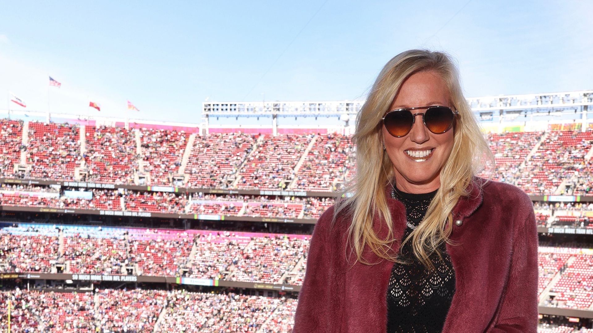 Dr. Elena Álvarez-Westwood brings fashion-forward style to Super Bowl LX with Thomas J. Henry