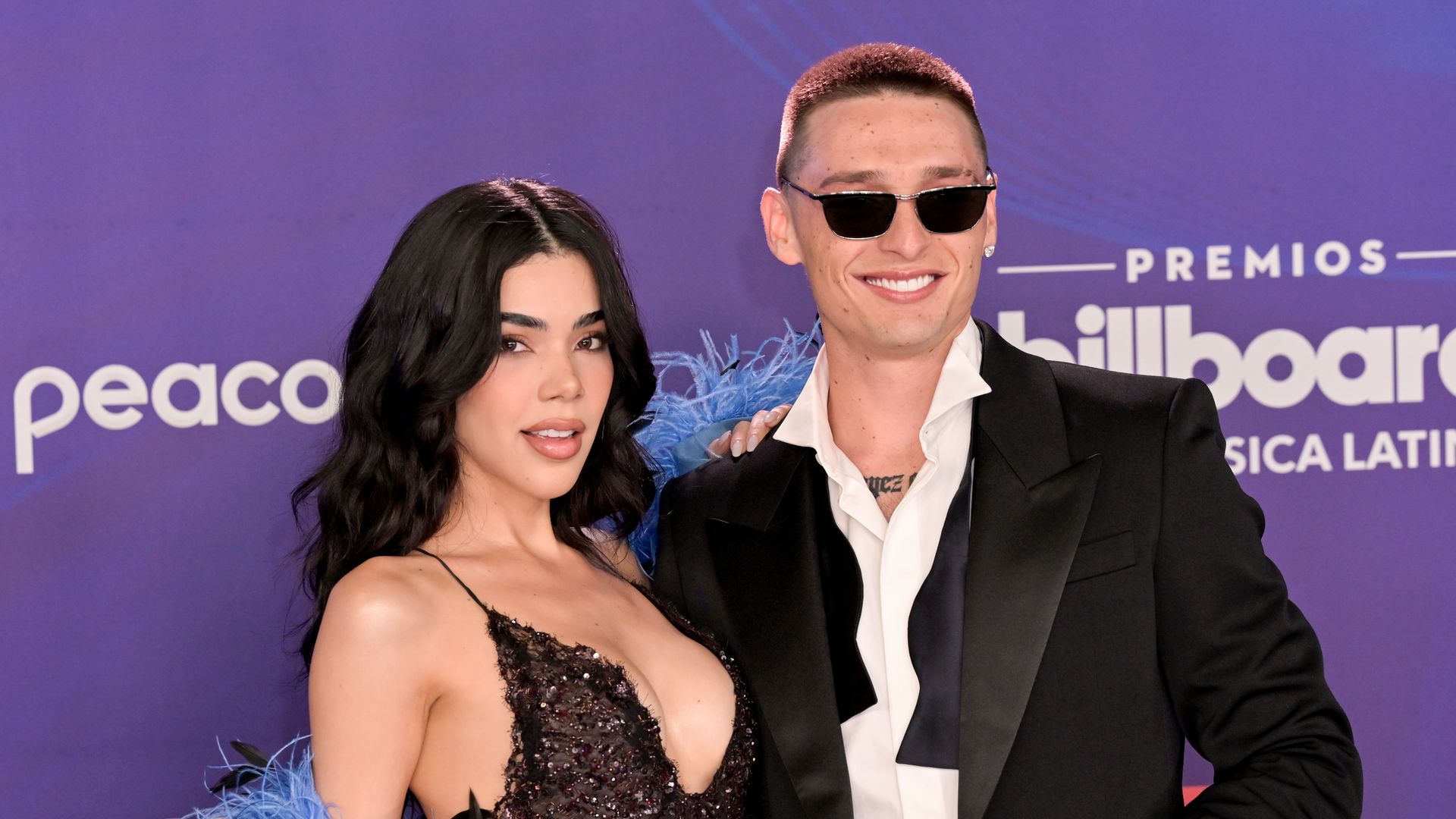Kenia Os and Peso Pluma attend the 2025 Billboard Latin Music Awards at James L. Knight Center on October 23, 2025 in Miami, Florida. 