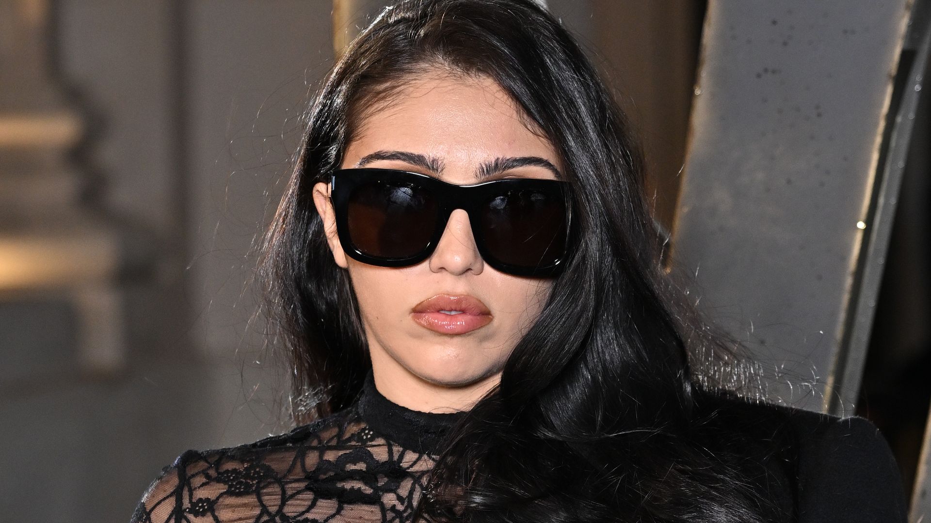 Lourdes Leon channels '90s cool in a nostalgic striped dress