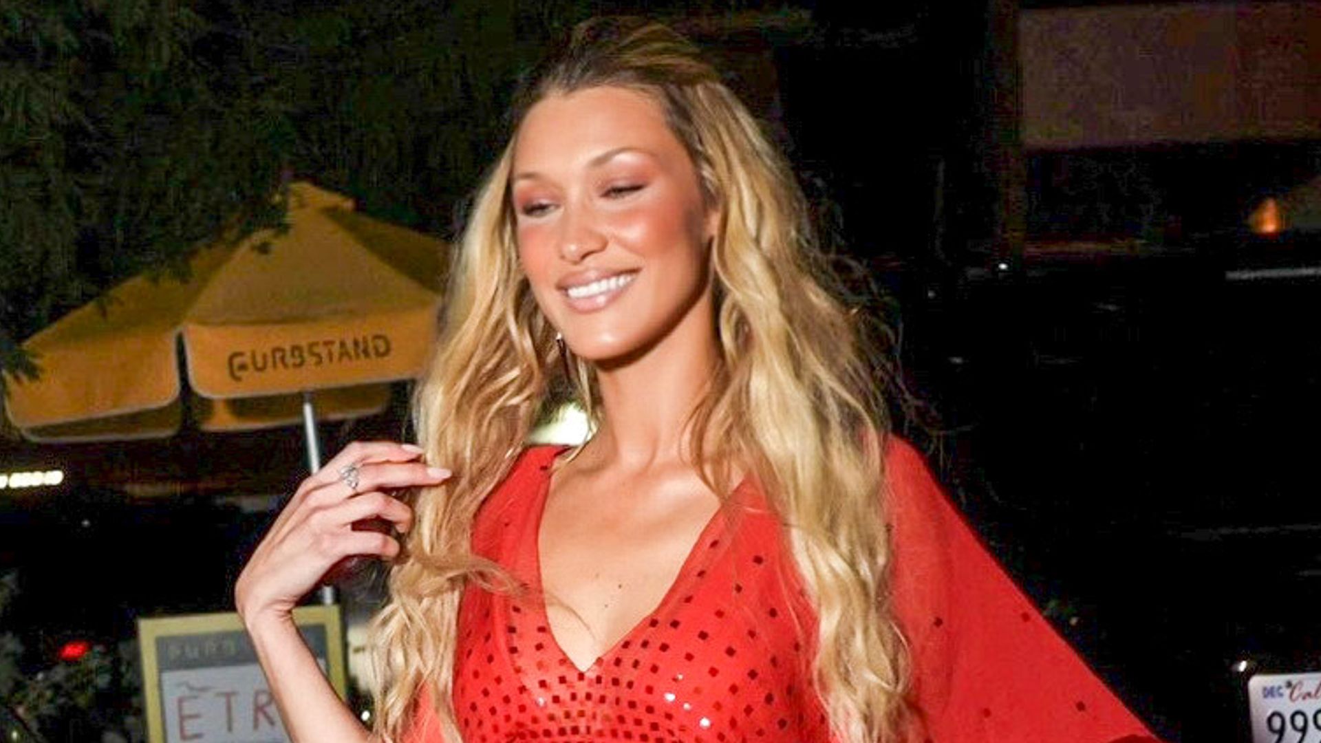 Bella Hadid wears red ruched halter top and vintage leather pumps, plus her most fiery red looks