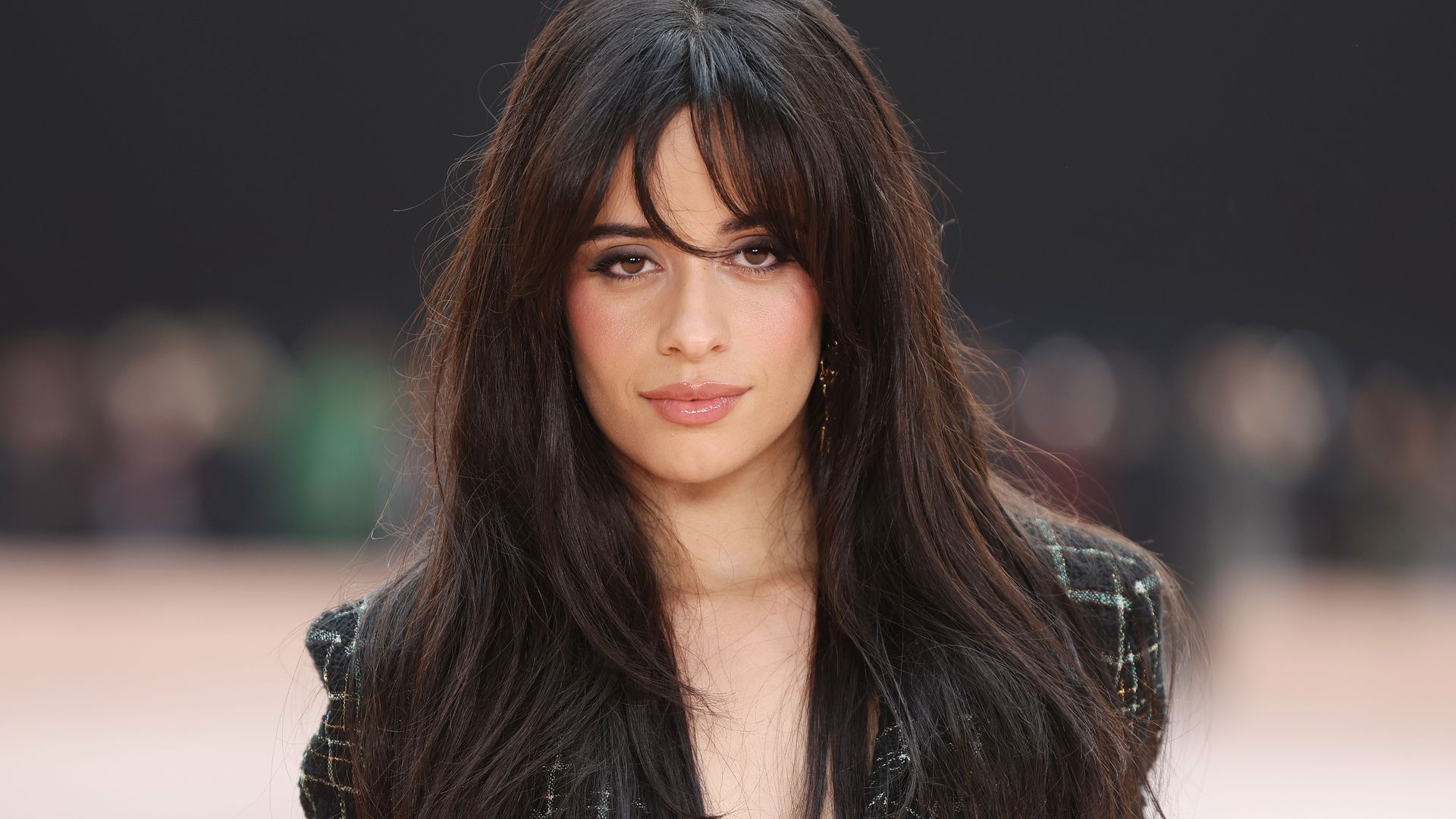 https://www.hola.com/us/horizon/landscape/e9f64be3bb39-paris-france-camila-cabello-attends-the-chanel-womenswear-fall-winter-2025-2026-.jpg?im=Resize=(1200)