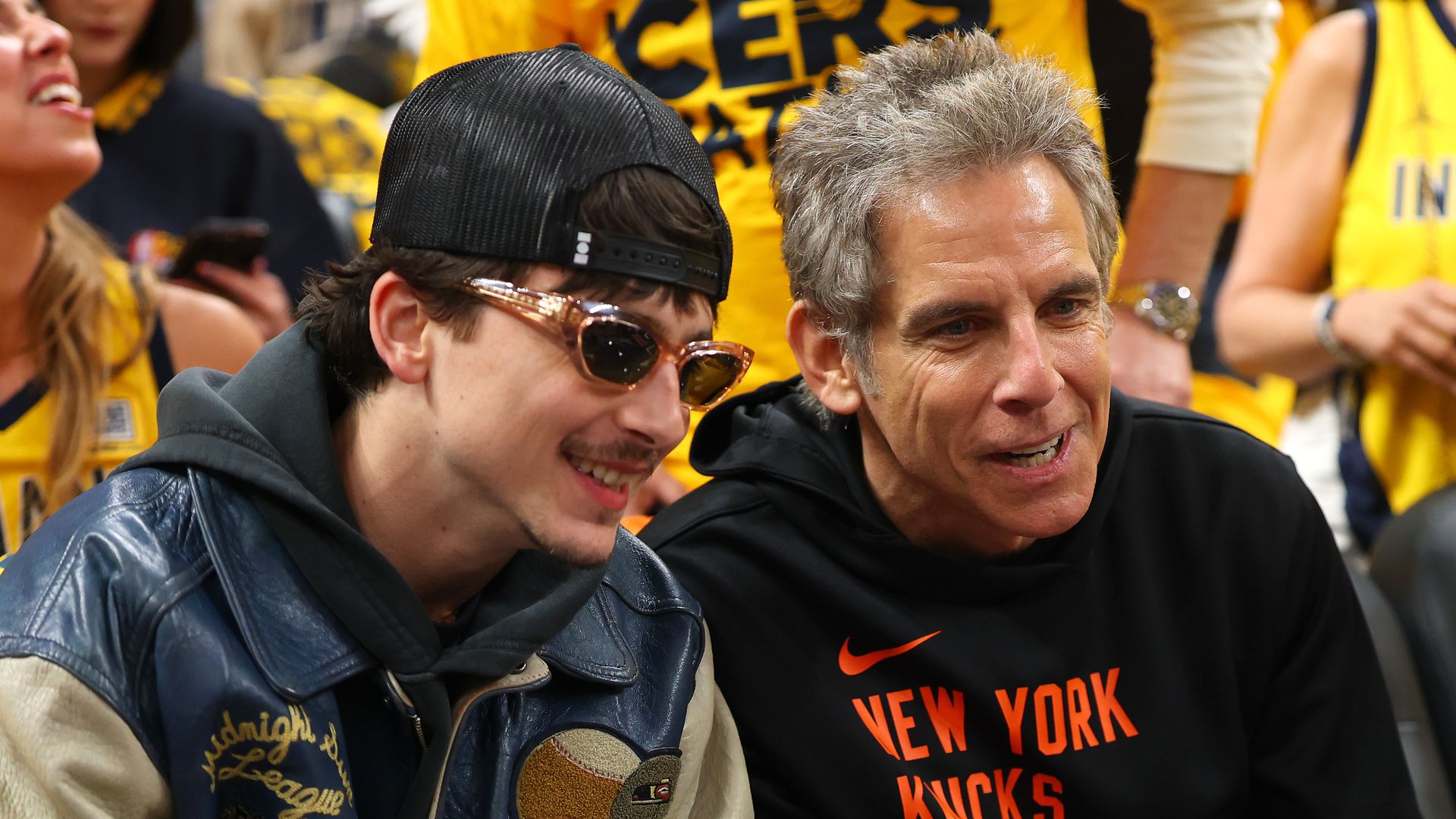 INDIANAPOLIS, INDIANA - MAY 27: TimothÃ©e Chalamet and Ben Stiller are seen prior to Game Four of the Eastern Conference Finals between the New York Knicks and the Indiana Pacers of the 2025 NBA Playoffs at Gainbridge Fieldhouse on May 27, 2025 in Indianapolis, Indiana. NOTE TO USER: User expressly acknowledges and agrees that, by downloading and or using this photograph, User is consenting to the terms and conditions of the Getty Images License Agreement. (Photo by Gregory Shamus/Getty Images) 