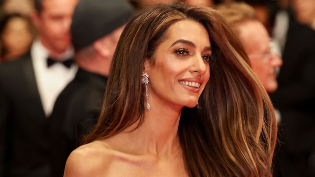  Amal Clooney posed in jaw-dropping gold corset dress with Karlie Kloss