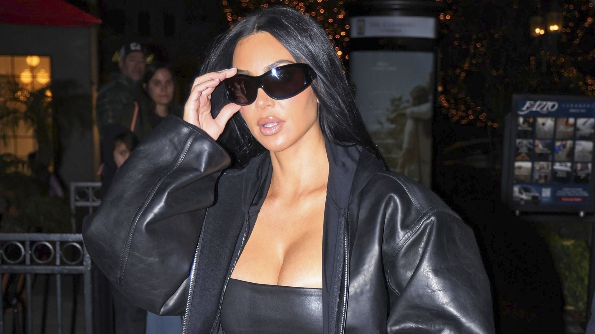 Kim Kardashian turns up the heat in hot pants and lacy ensemble