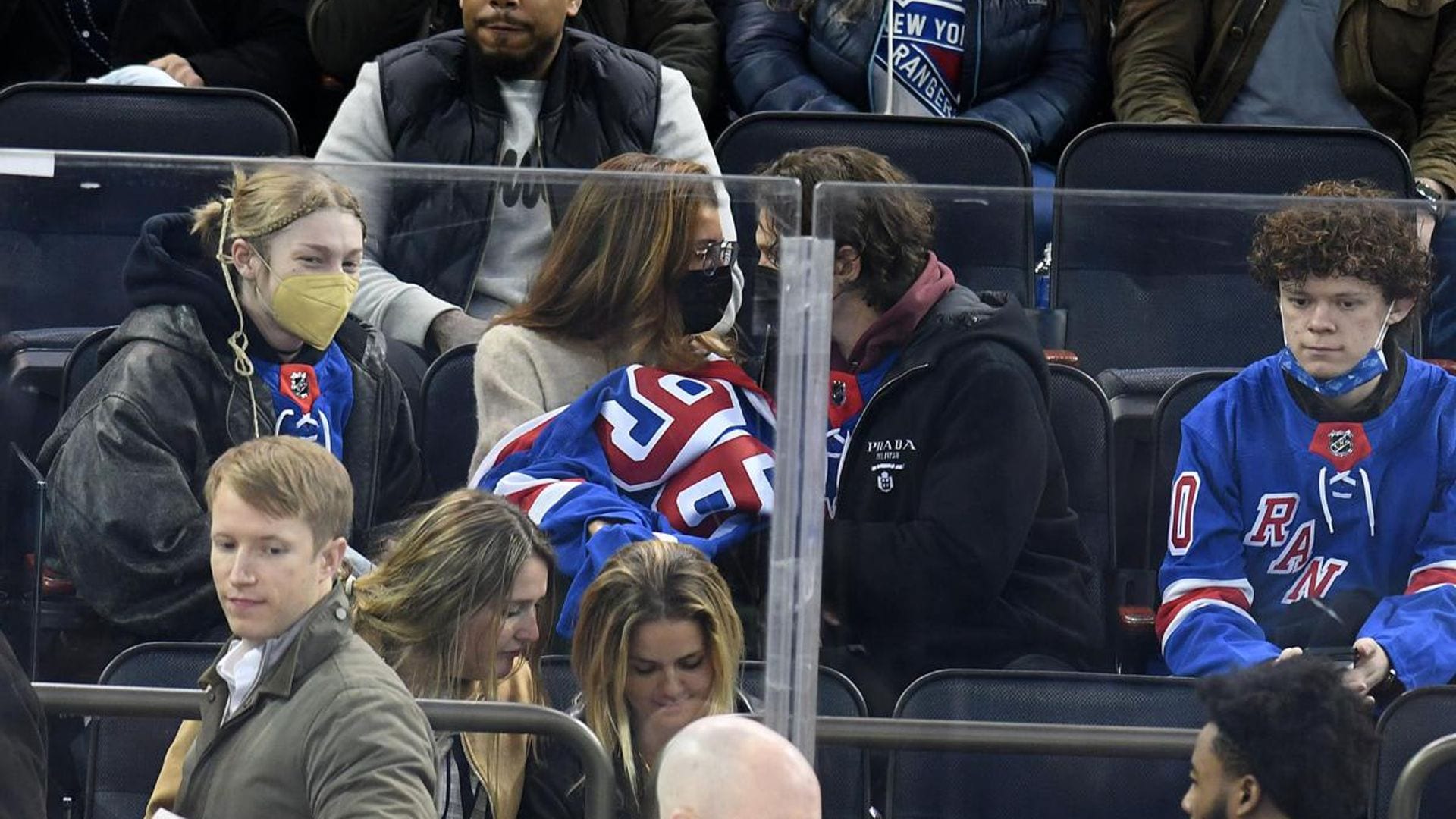 Zendaya and Tom Holland attend the Rangers Game while wearing matching jerseys