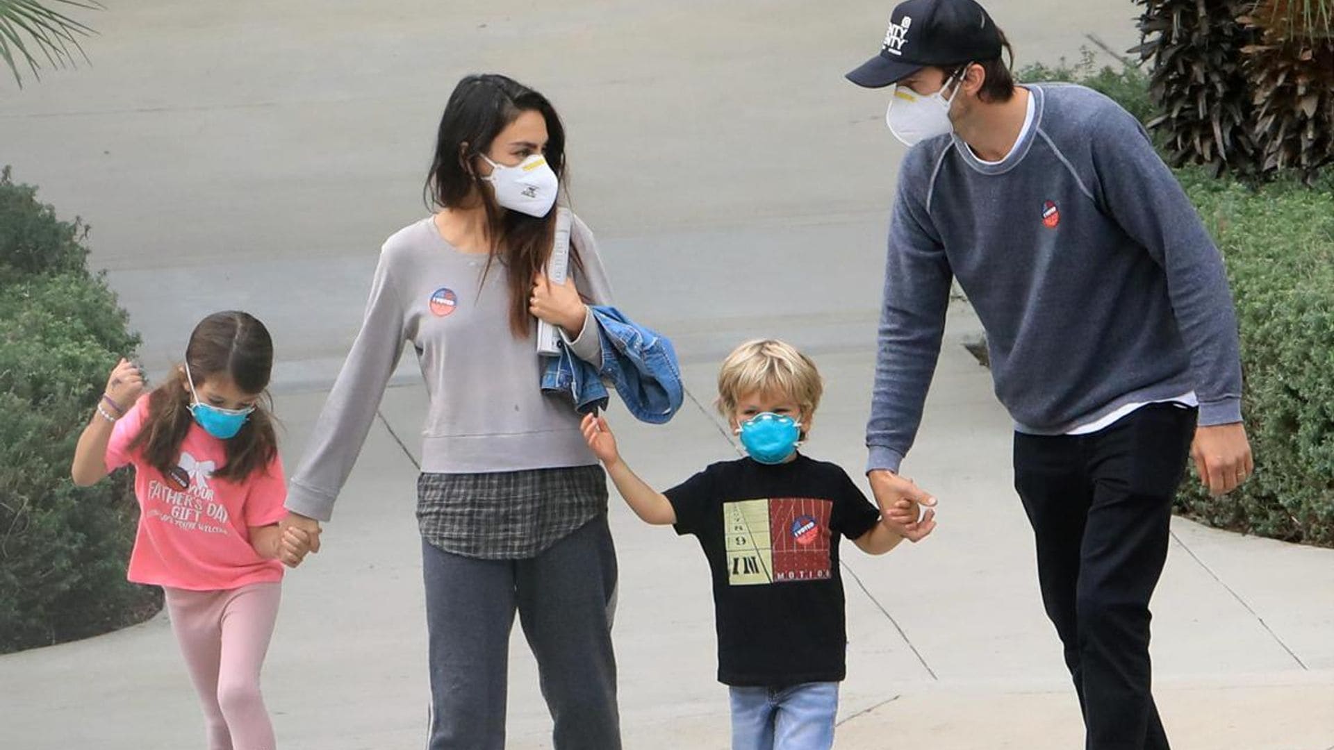 Mila Kunis and Ashton Kutcher proudly took their kids with them to vote