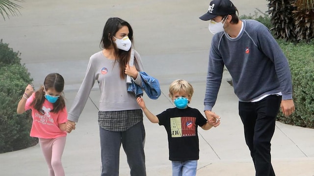 Mila Kunis and Ashton Kutcher voting