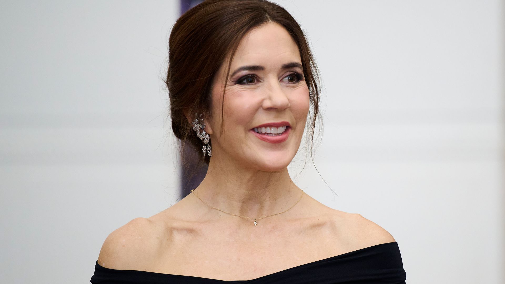 Queen Mary channels bridal elegance in lace ensemble, with a subtle nod to her roots