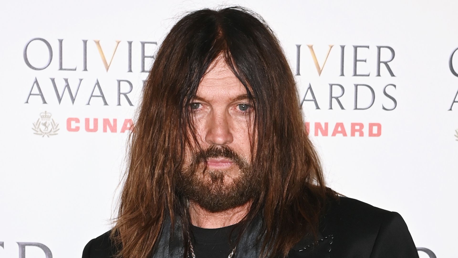 LONDON, ENGLAND - APRIL 12: Billy Ray Cyrus poses in the winners room at The Olivier Awards 2026, celebrating their 50th anniversary, at Royal Albert Hall on April 12, 2026 in London, England. (Photo by Alan Chapman/Dave Benett/Getty Images)
