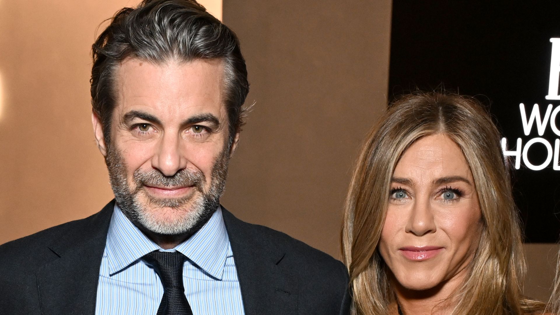 LOS ANGELES, CALIFORNIA - NOVEMBER 17: (L-R) Jim Curtis and Jennifer Aniston, wearing Ralph Lauren, attend ELLE's 2025 Women in Hollywood Celebration presented by Ralph Lauren and Bvlgari with support from evian, Hendrick's Gin, and Lucid Motors on November 17, 2025 in Los Angeles, California. (Photo by Michael Kovac/Getty Images for ELLE)