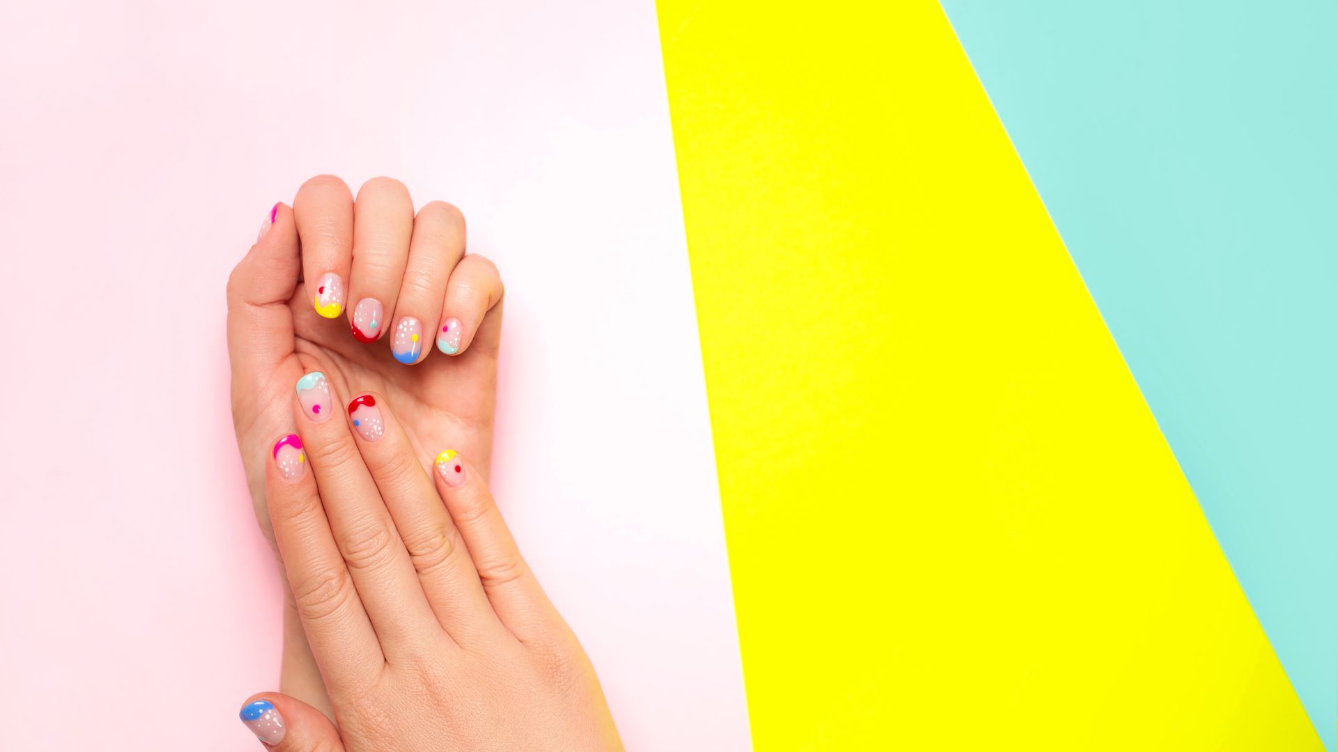 https://www.hola.com/us/horizon/landscape/f0172924335e-female-hands-with-trendy-colorful-french-manicure-are-lying-on-bright-multicolor.jpg?im=Resize=(1200)