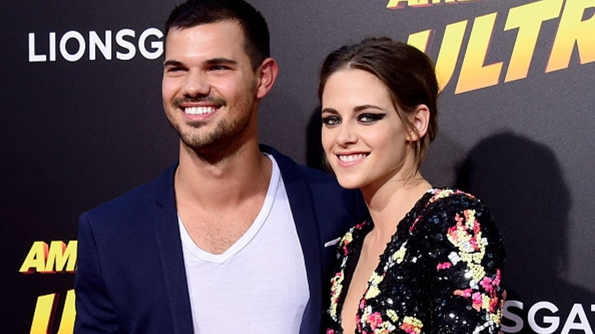 Kristen Stewart reunites with Taylor Lautner at 'American Ultra' premiere