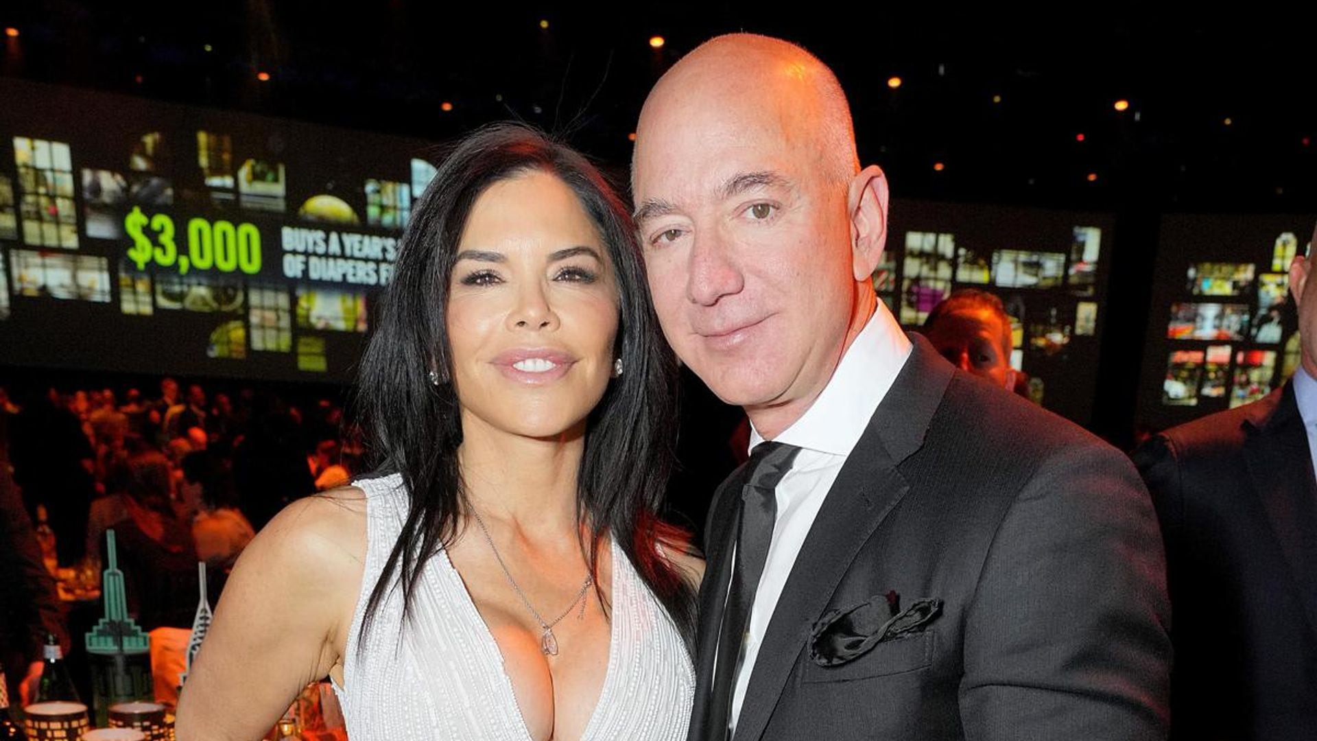 Lauren Sanchez and Jeff Bezos look like royalty stepping out of the Connaught Hotel in London