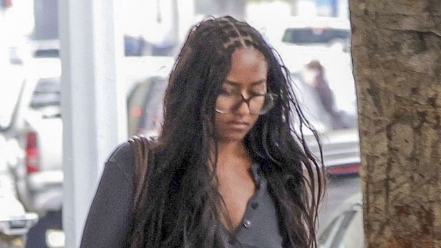 Sasha was photographed wearing a laid back combination of a crop top and sweats