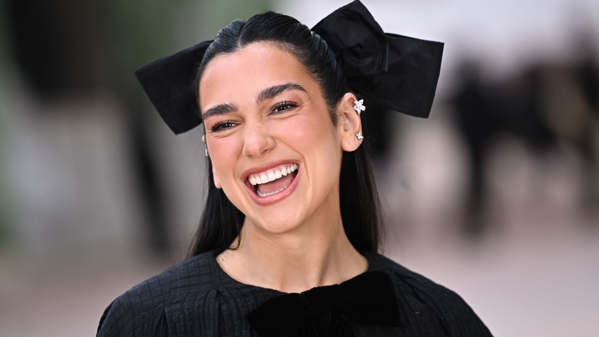 Dua Lipa downs pint of Guinness to celebrate sold-out stadium shows
