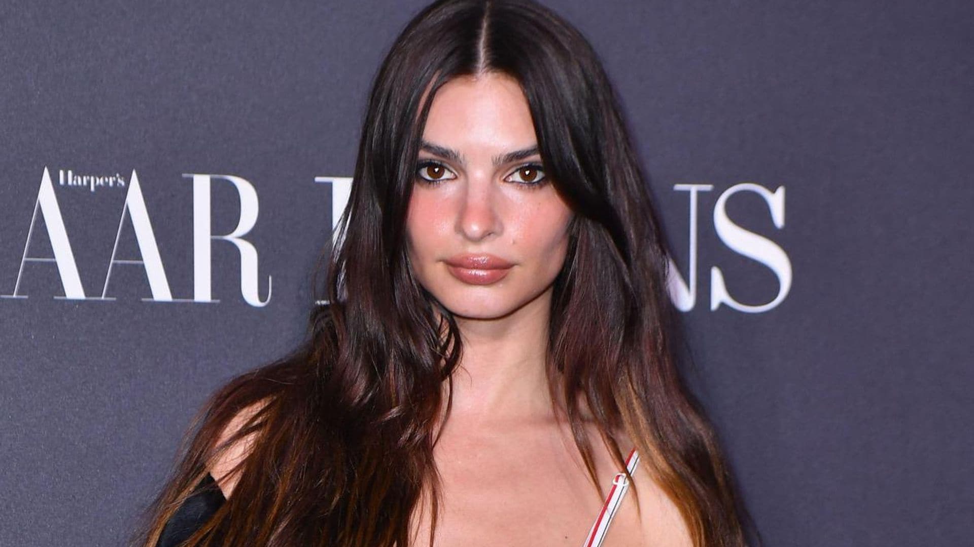 Emily Ratajkowski shares passionate kiss with mystery man amid Brad Pitt dating rumors