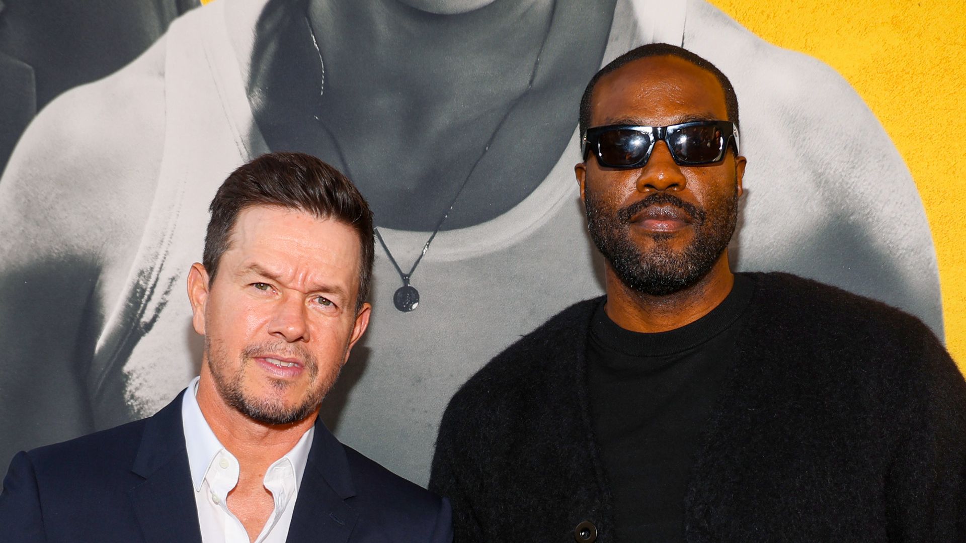 LOS ANGELES, CALIFORNIA - SEPTEMBER 01: (L-R) Mark Wahlberg and Yahya Abdul-Mateen II attend the "By Any Means" Los Angeles Premiere at Paramount Pictures Studios on September 01, 2026, in Los Angeles, California. (Photo by Phillip Faraone/Getty Images for Paramount Pictures)