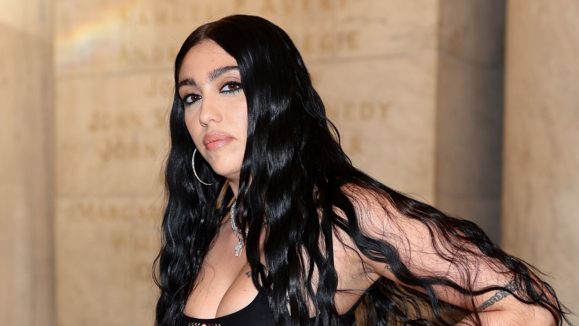Lourdes Leon poses in fishnet cut-out dress at Marc Jacobs show in New York City