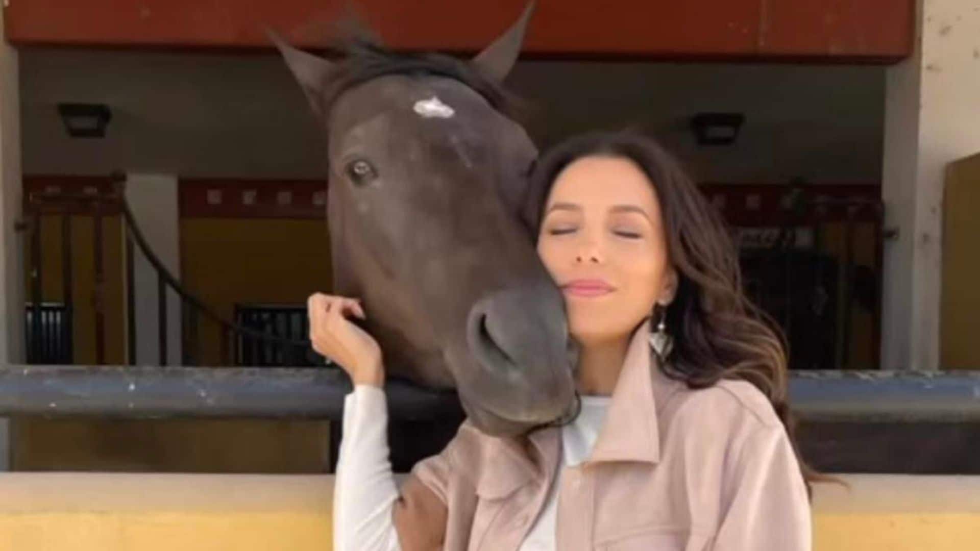 Eva Longoria spends time in Mexico and nuzzles up with a horse