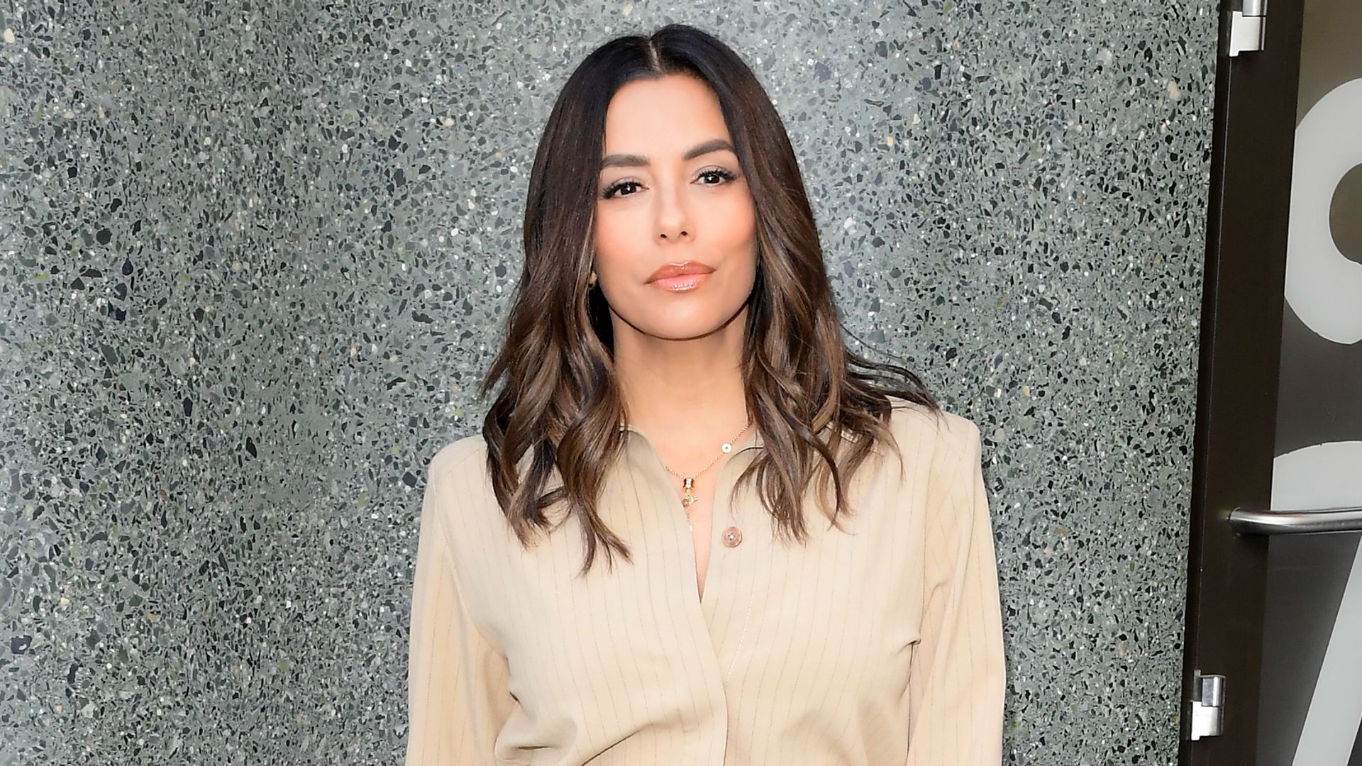 Eva Longoria embraces minimalism in Paris with chic neutral look and soft glam makeup