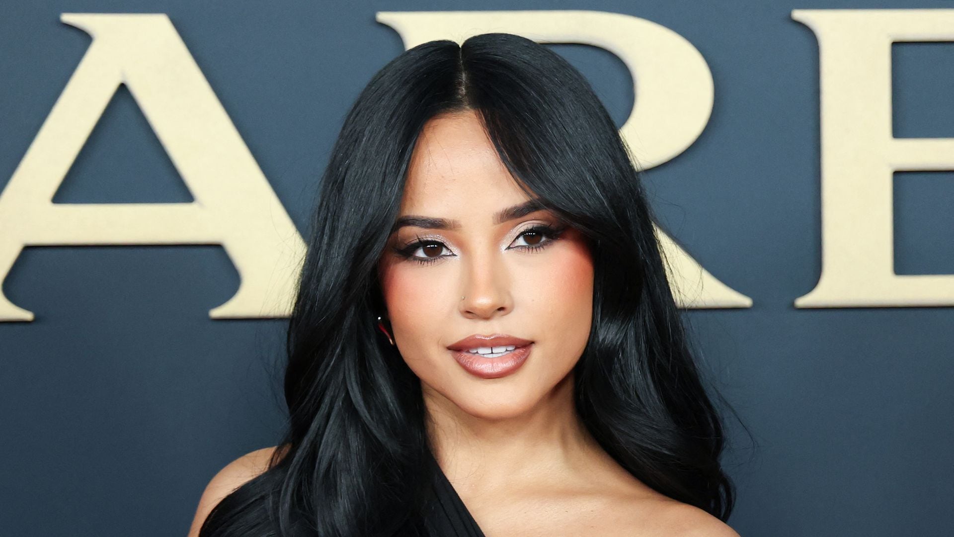Becky G’s bold manicure made a statement at the 2026 MusiCares Gala: Her nails carried a political message