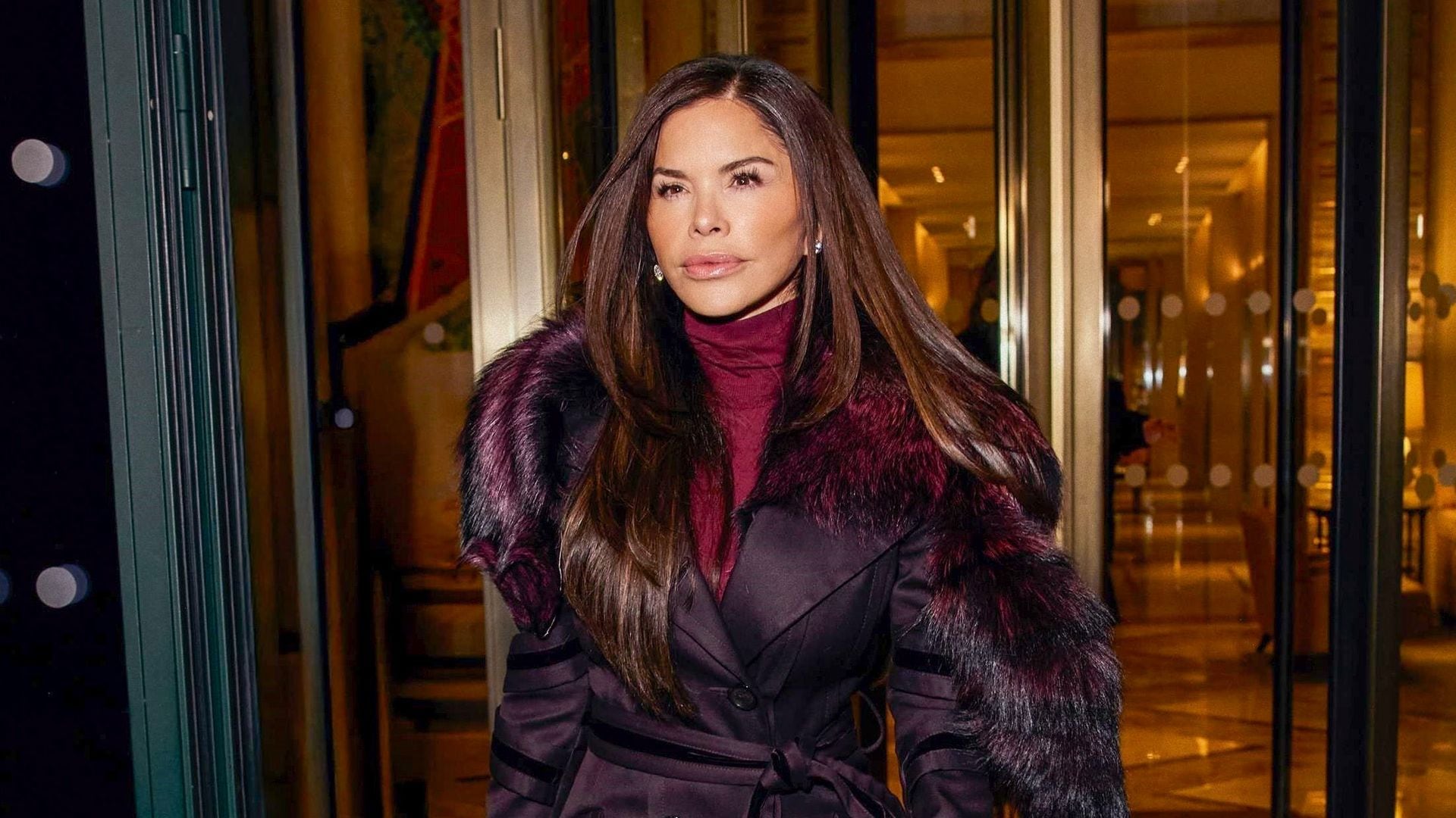 
Lauren Sanchez was spotted leaving her hotel in Paris, turning heads in a vintage Tom Ford for Gucci Fall/Winter 2004 coat, pairing the piece with an elegant Eterne dress and Alaia shoes. 